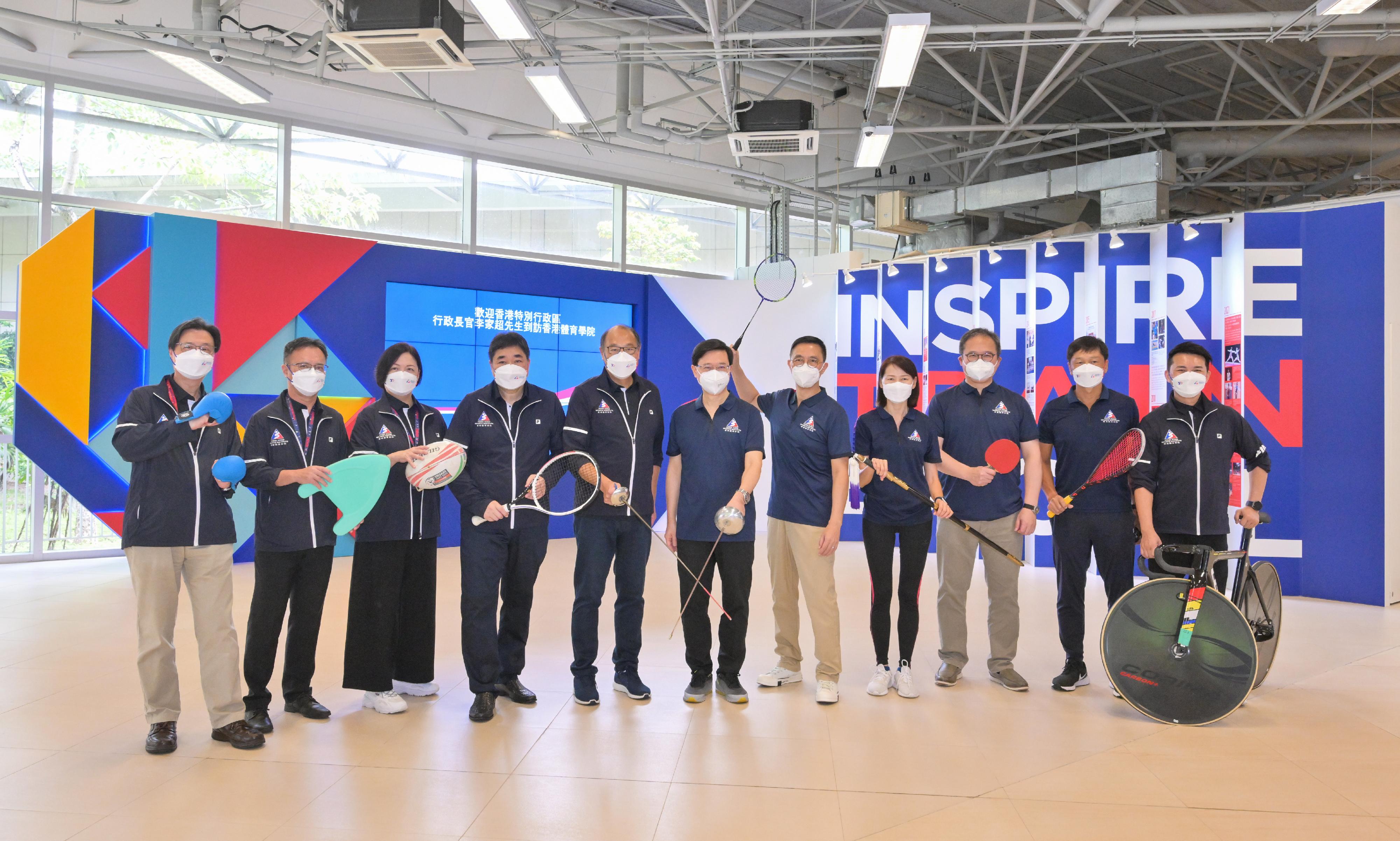 The Chief Executive, Mr John Lee, today (August 16) visited the Hong Kong Sports Institute (HKSI). Photo shows (from fourth left) the Deputy Chief Executive of the HKSI, Mr Tony Choi; the Chairman of the Board of Directors of the HKSI, Dr Lam Tai-fai; Mr Lee; the Secretary for Culture, Sports and Tourism, Mr Kevin Yeung; the Director of the Chief Executive's Office, Ms Carol Yip; the Permanent Secretary for Culture, Sports and Tourism, Mr Joe Wong; the Commissioner for Sports, Mr Yeung Tak-keung, and other representatives of the HKSI.