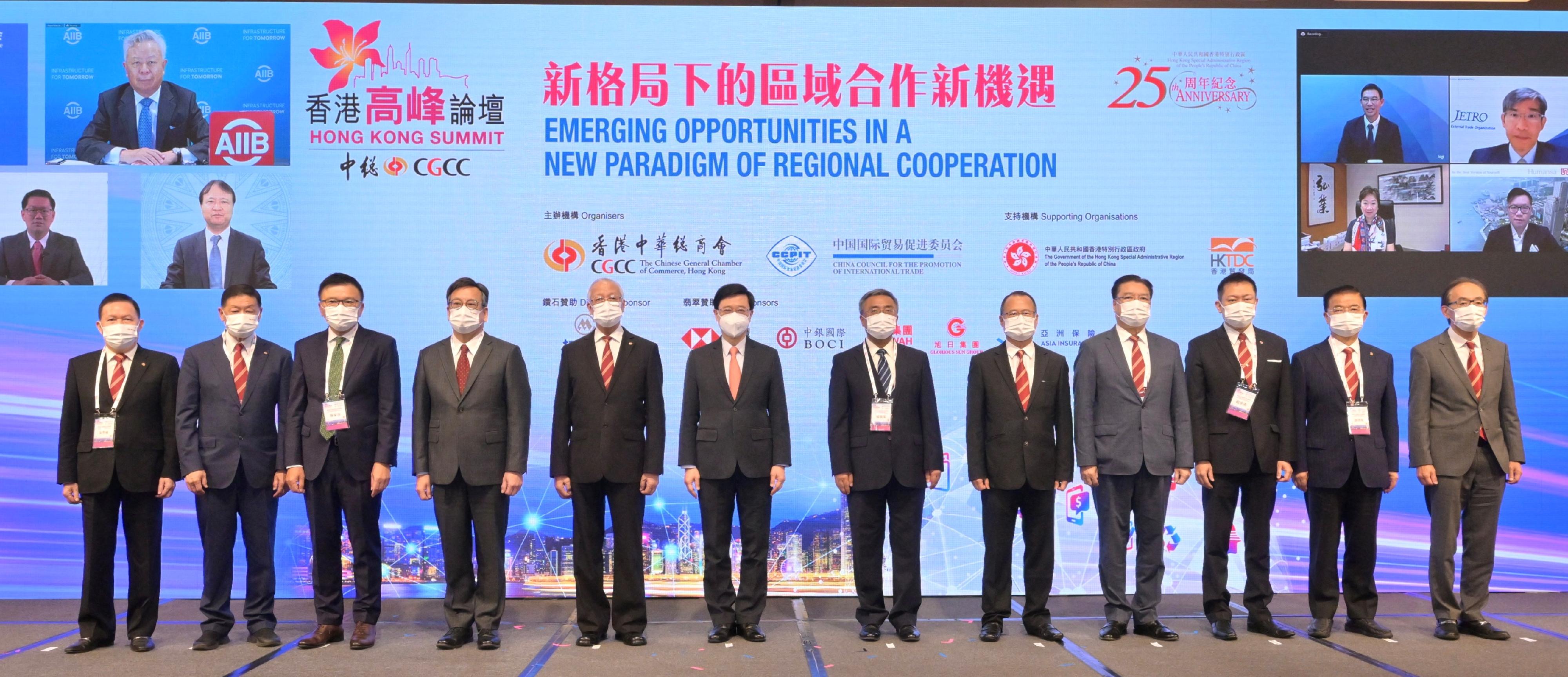 The Chief Executive, Mr John Lee, attended the Chinese General Chamber of Commerce Hong Kong Summit 2022 today (August 17). Photo shows (from fourth left) the Secretary for Commerce and Economic Development, Mr Algernon Yau; the Chairman of the Chinese General Chamber of Commerce, Hong Kong, Mr Yuen Mo; Mr Lee; the Acting Commissioner of the Office of the Commissioner of the Ministry of Foreign Affairs in the Hong Kong Special Administrative Region, Mr Yang Yirui; Permanent Honorary President of the Chinese General Chamber of Commerce, Hong Kong Dr Jonathan Choi; and other guests at the opening ceremony.