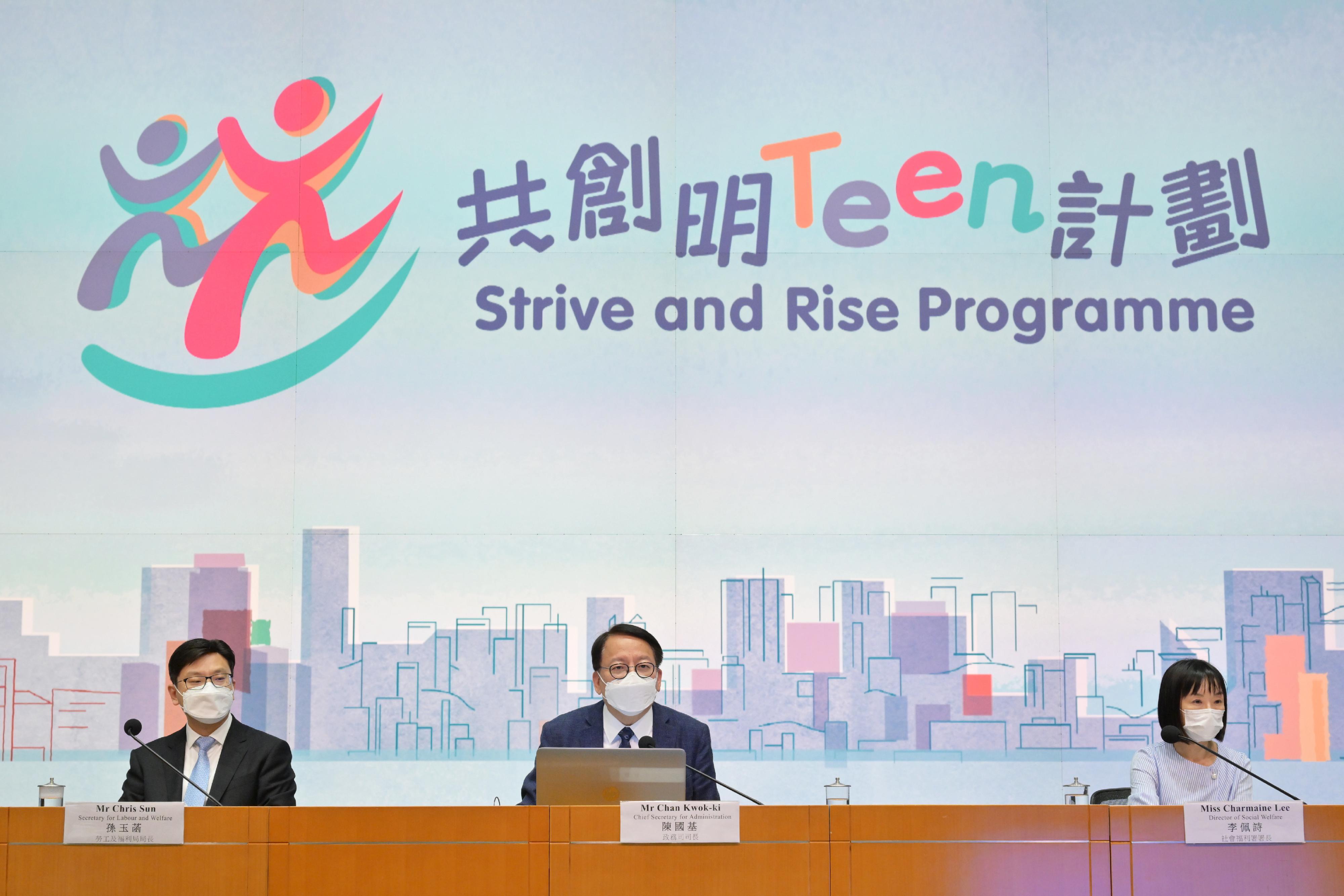 The Chief Secretary for Administration, Mr Chan Kwok-ki (centre), together with the Secretary for Labour and Welfare, Mr Chris Sun (left), and the Director of Social Welfare, Miss Charmaine Lee (right), held a press conference today (August 22) on the Strive and Rise Programme launched by the Task Force to Lift Underprivileged Students out of Intergenerational Poverty at the Central Government Offices, Tamar.