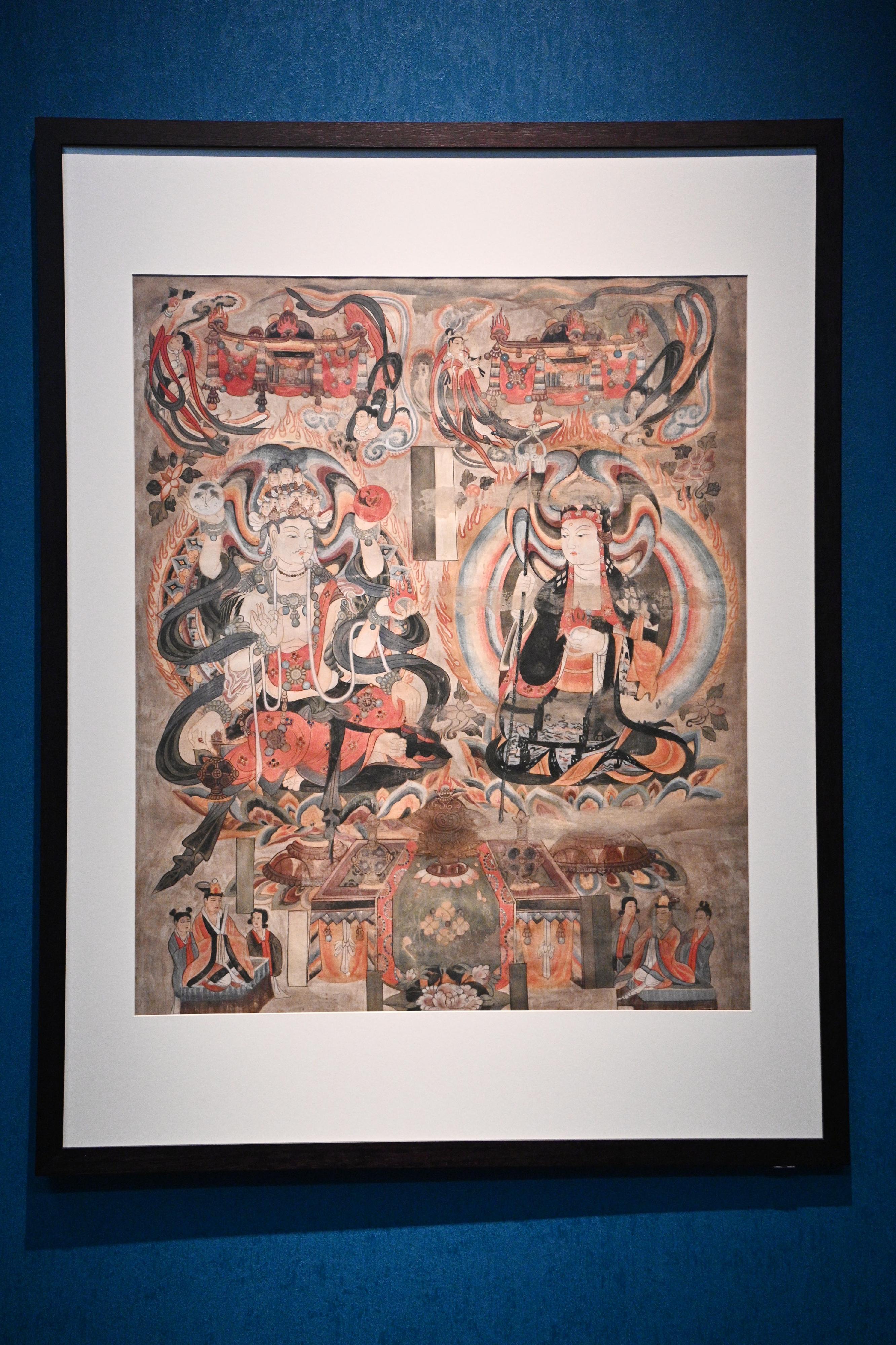 The opening ceremony for the exhibition "The Hong Kong Jockey Club Series: Dunhuang: Enchanting Tales for Millennium" was held today (August 23) at the Hong Kong Heritage Museum. Picture shows the reproduction of silk painting "Eleven-faced Avalokitesvara and Ksitigarbha with the Ten Kings of Hell".
