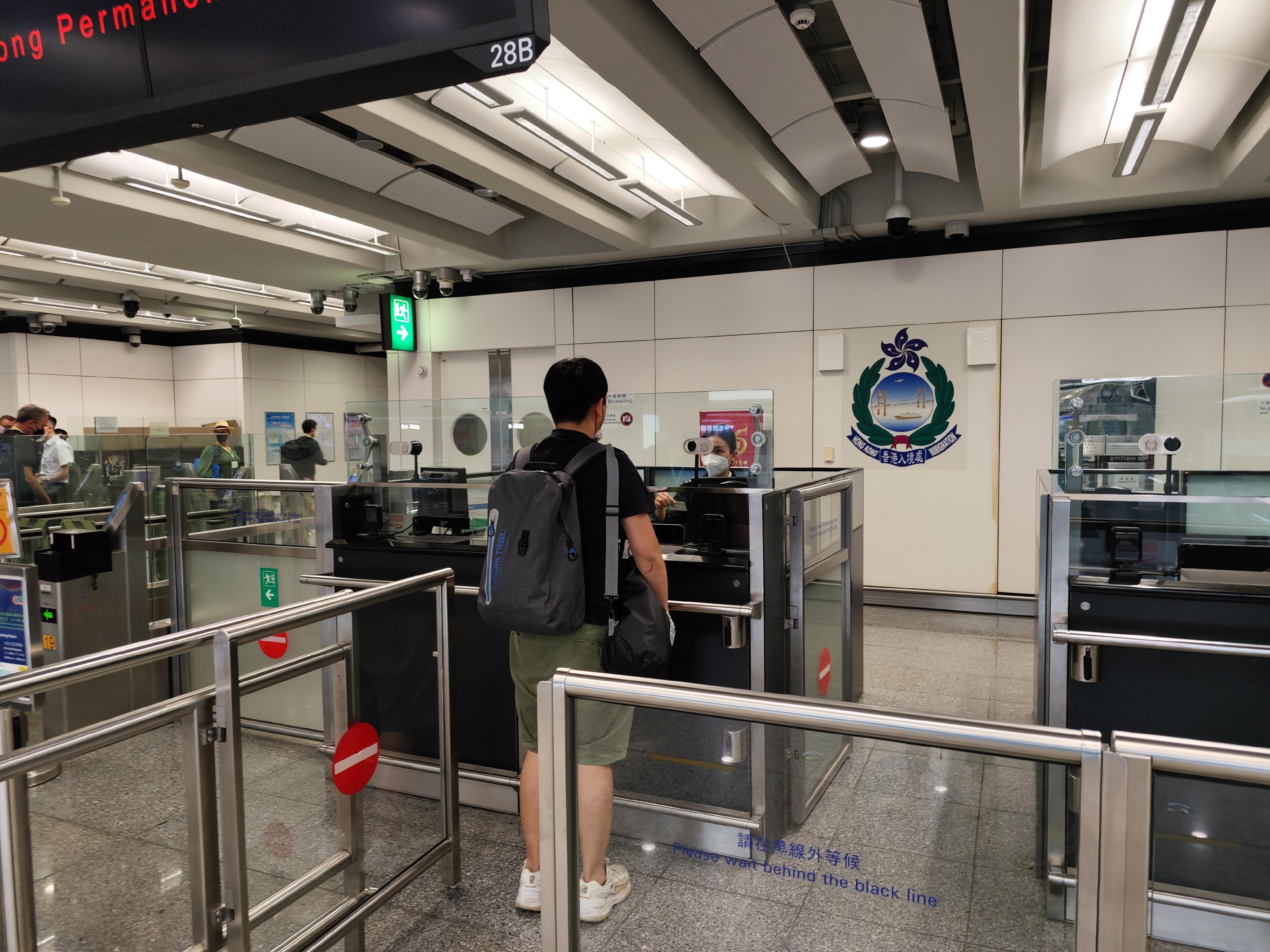 An assistance seeker safely arrived at Hong Kong International Airport today (August 28). Photo shows Immigration staff assisting the concerned assistance seeker to go through immigration clearance at a designated counter.