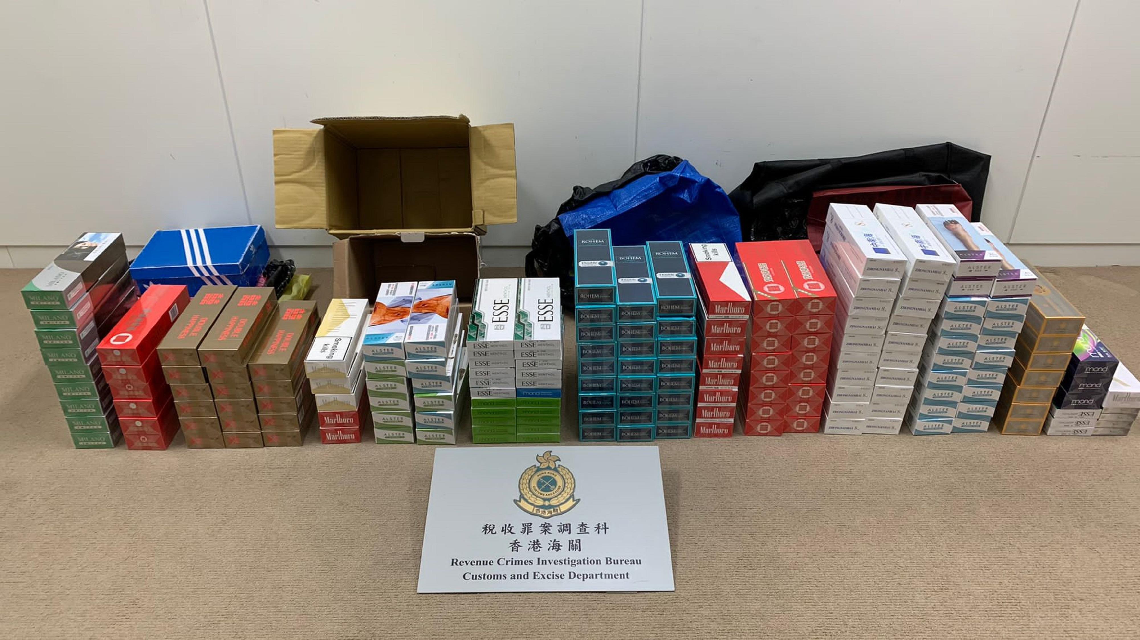 Hong Kong Customs has mounted a special enforcement operation in the past three weeks to combat illicit cigarette telephone-ordering activities in public rental housing (PRH) estates in Kowloon East District. A total of about 150 000 suspected illicit cigarettes and about seven grams of suspected cannabis buds were seized. The estimated market value of the suspected illicit cigarettes was about $420,000 with a duty potential of about $290,000. Photo shows the suspected illicit cigarettes seized in a PRH unit in Lam Tin.