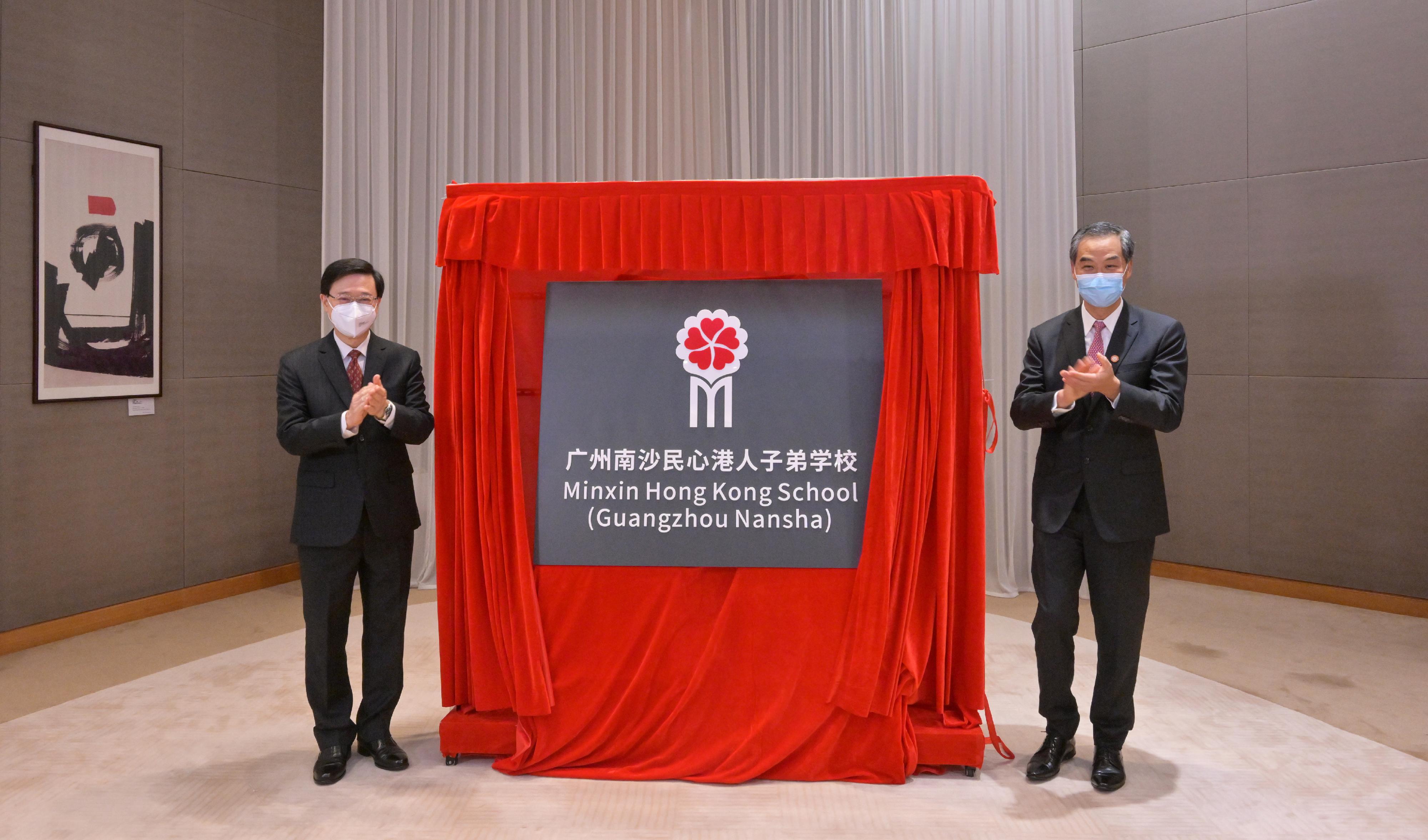 The Chief Executive, Mr John Lee, attended the opening ceremony of Minxin Hong Kong School in Nansha, Guangzhou, in the form of video conferencing today (September 1). Photo shows Mr Lee (left) and Vice-Chairman of the National Committee of the Chinese People's Political Consultative Conference and Chairperson of the School Board of Minxin Hong Kong School Mr C Y Leung (right), at the ceremony.