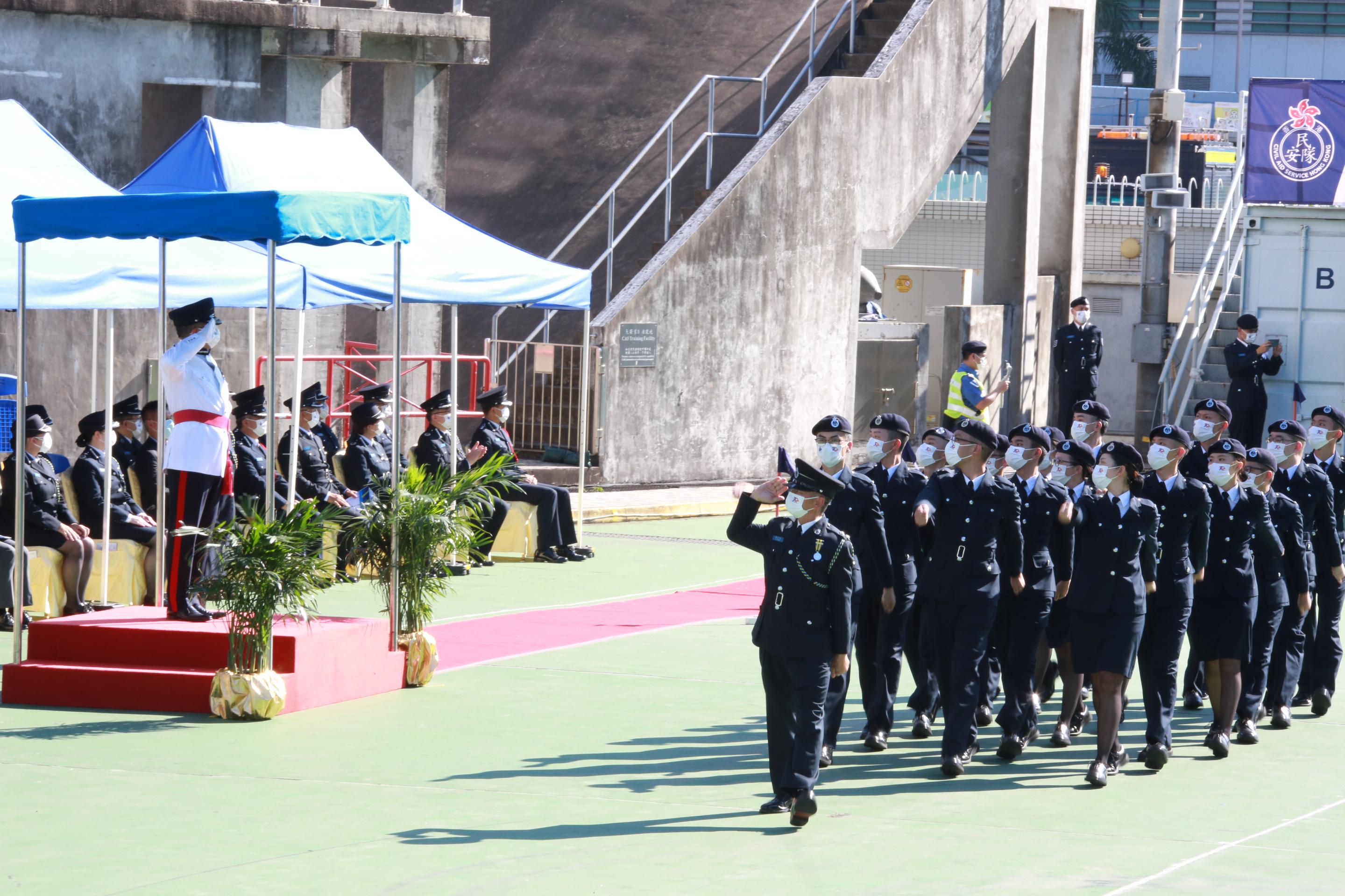 The Civil Aid Service held the 84th Recruits Passing-out Parade at its headquarters today (September 4).  Photo shows the parade marching past the review stand.
