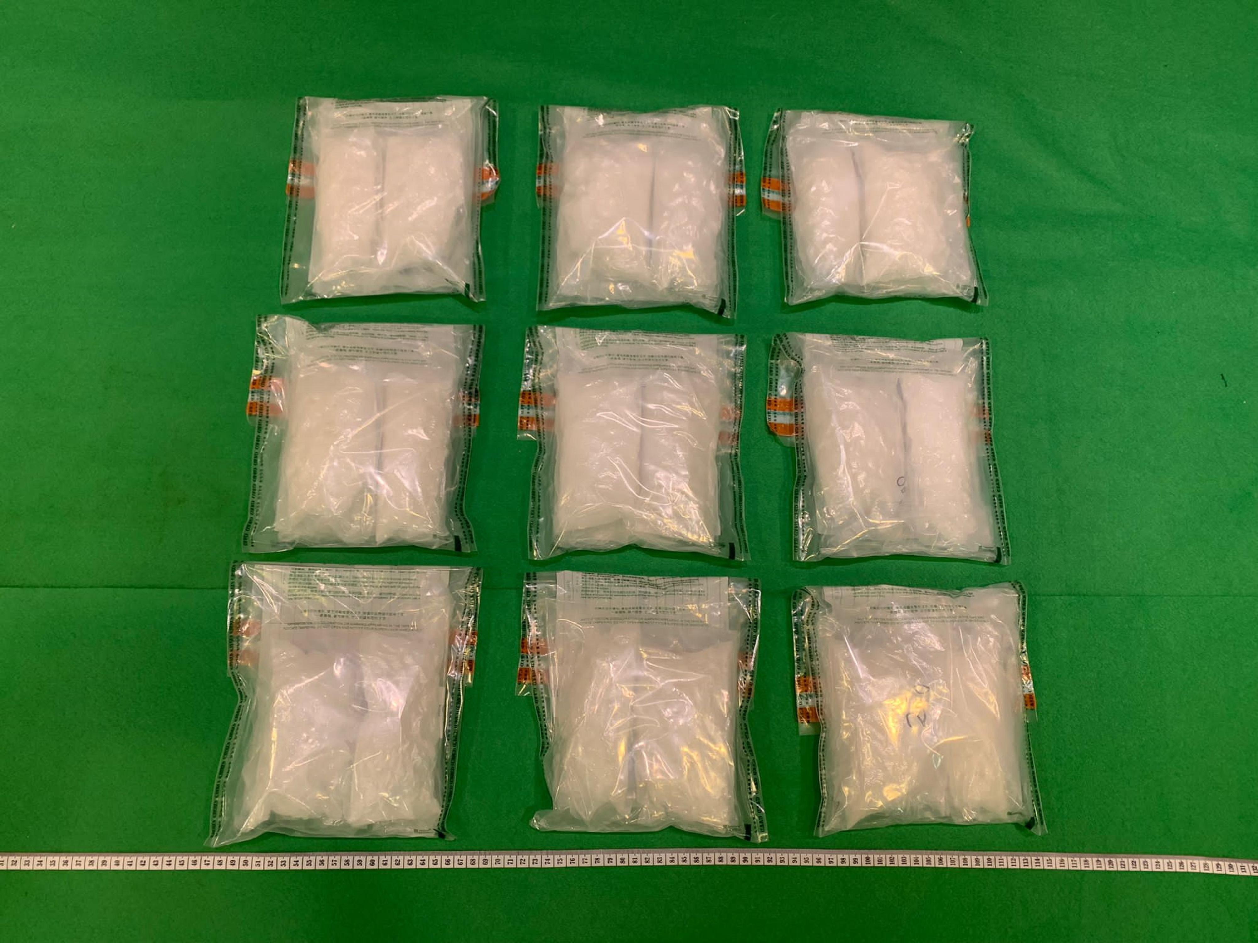 Hong Kong Customs on August 9 and 15 and yesterday (September 7) seized about 12 kilograms of suspected methamphetamine and about 570 grams of suspected heroin, with an estimated market value of about $6.9 million and about $680,000 respectively, in Hong Kong International Airport, Tuen Mun, Kwai Chung, Mong Kok and San Po Kong. Photo shows the suspected methamphetamine seized by Customs officers in the airport.