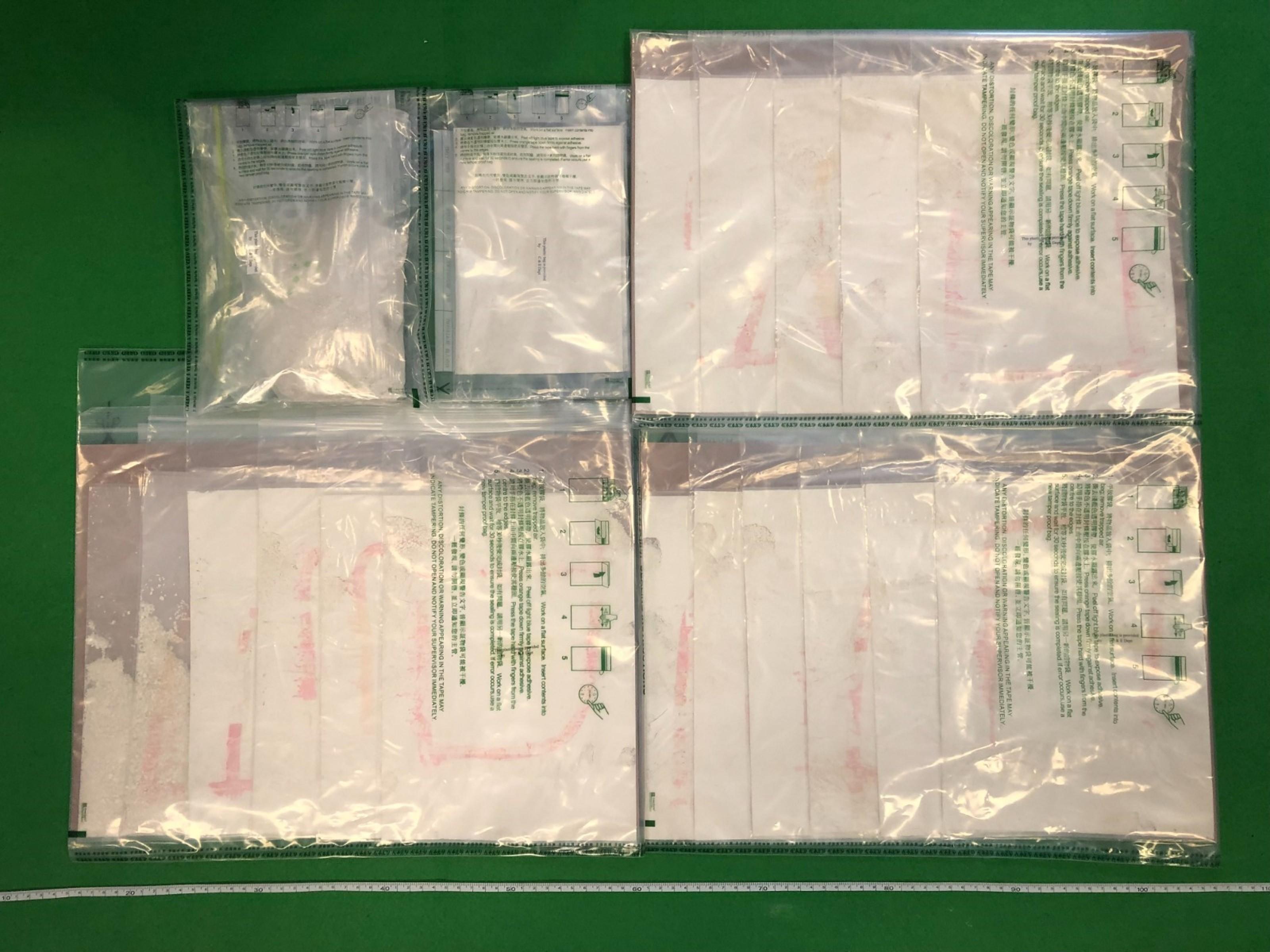 Hong Kong Customs on August 9 and 15 and yesterday (September 7) seized about 12 kilograms of suspected methamphetamine and about 570 grams of suspected heroin, with an estimated market value of about $6.9 million and about $680,000 respectively, in Hong Kong International Airport, Tuen Mun, Kwai Chung, Mong Kok and San Po Kong. Photo shows the suspected heroin seized by Customs officers in San Po Kong.