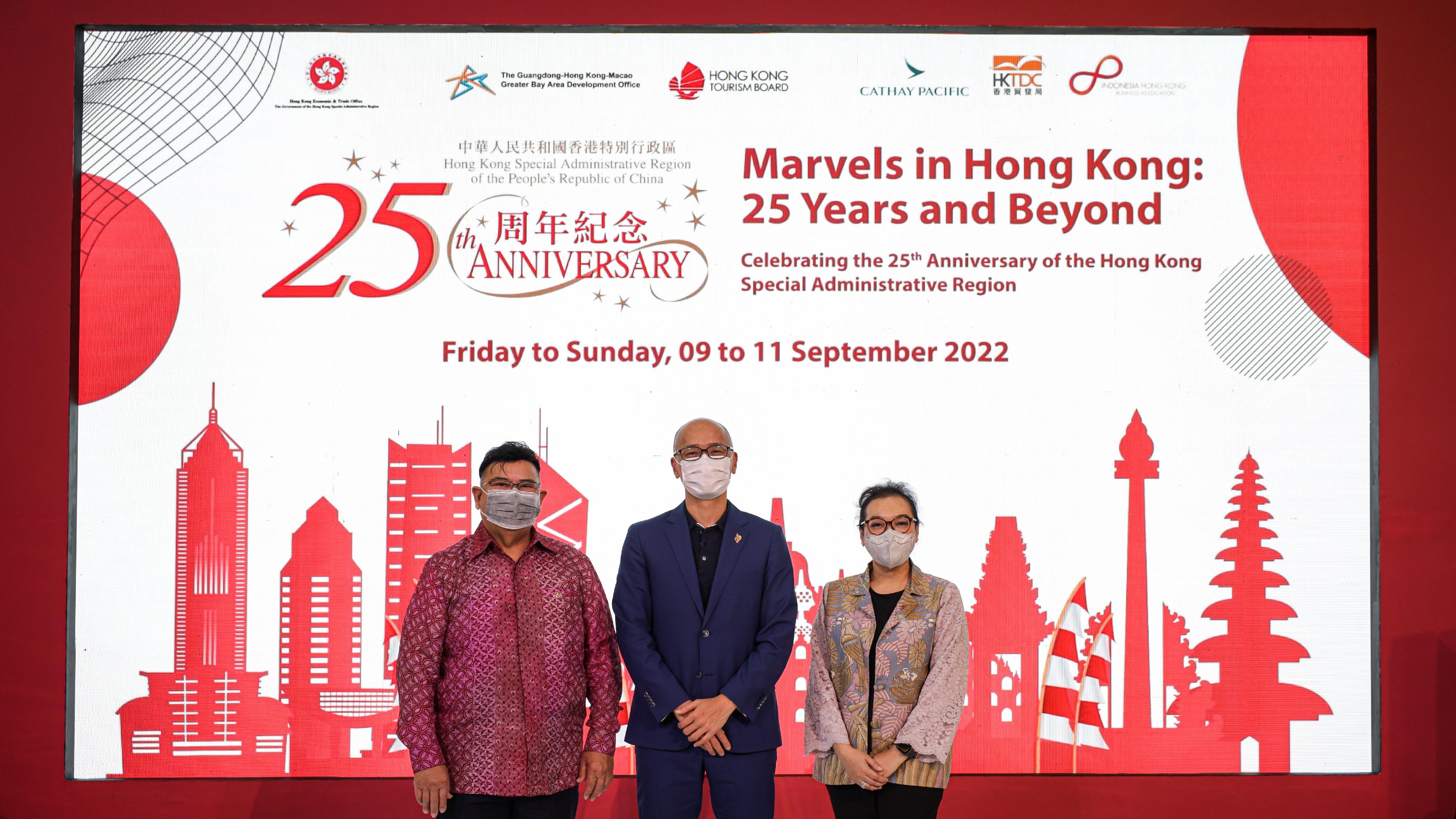 The Hong Kong Economic and Trade Office, Jakarta (HKETO Jakarta) today (September 9) hosted the opening ceremony of the "Marvels in Hong Kong: 25 Years and Beyond" roving exhibition in Jakarta, Indonesia, to celebrate the 25th anniversary of the establishment of the Hong Kong Special Administrative Region. Photo shows (from left) the Chairman of the Indonesia Hong Kong Business Association, Mr James Budiono; the Director-General of HKETO Jakarta, Mr Law Kin-wai; and the Officer-in-charge of Indonesia of the Hong Kong Trade Development Council, Ms Rachel Kurniawan, officiating at the launch ceremony of the exhibition.