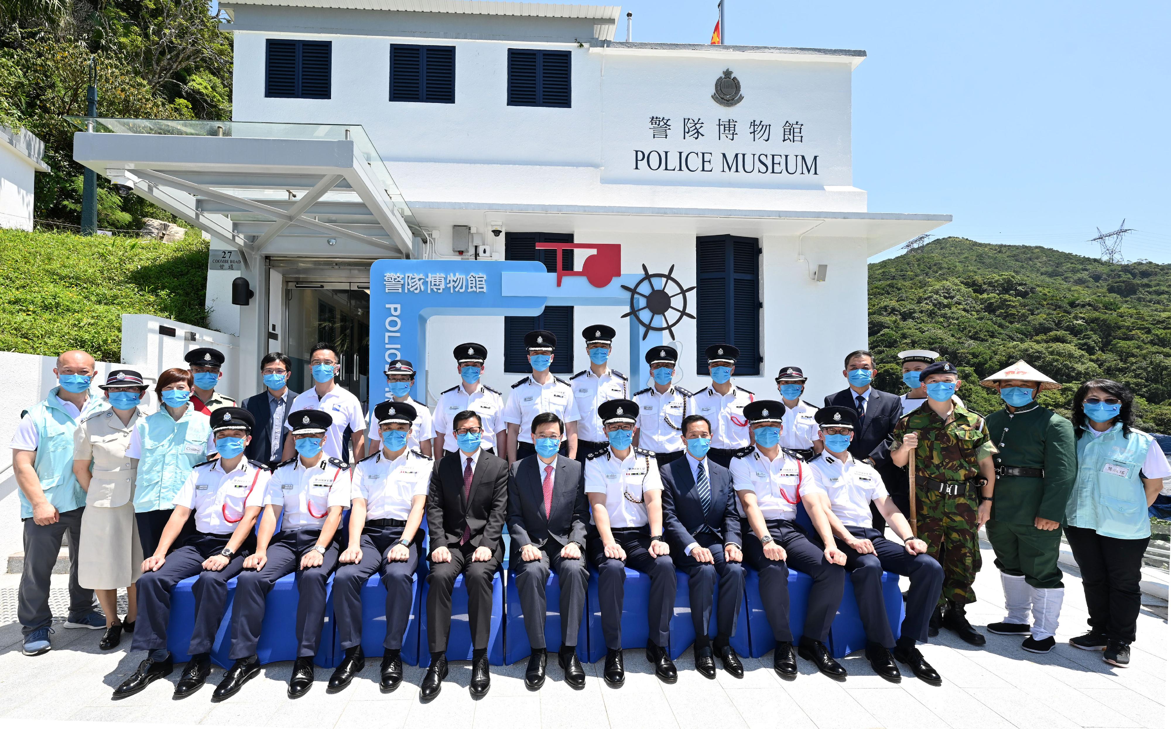 The Reopening Ceremony of Police Museum was held today (September 9). Photo shows the Chief Executive, Mr John Lee (front row, centre); the Secretary for Security, Mr Tang Ping-keung (front row, fourth left); the Commissioner of Police, Mr Siu Chak-yee (front row, fourth right) and honorable guest, Mr Tang Yat-sun (front row, third right) taking a group photo with police officers and docent volunteers in front of the museum.