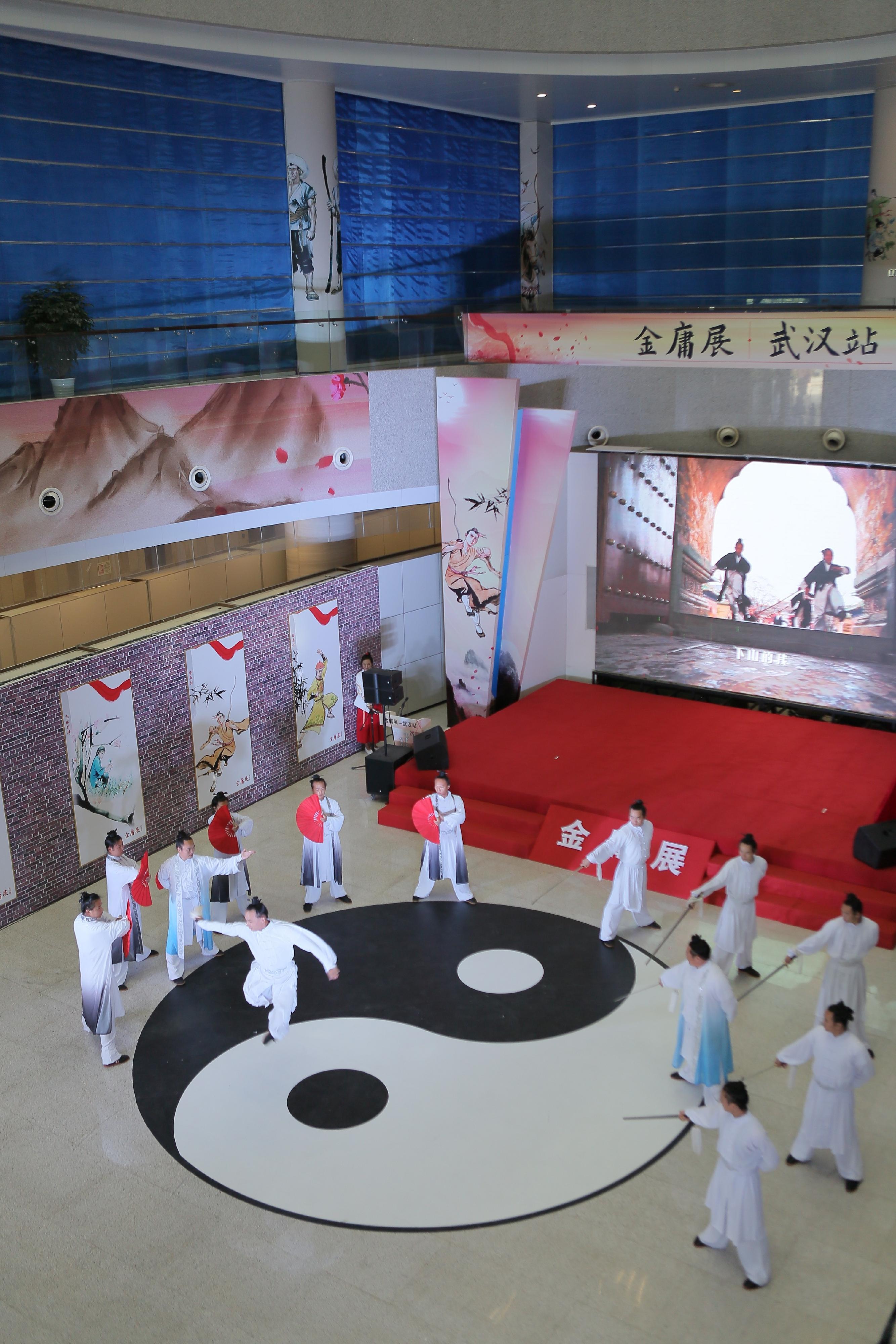 A themed exhibition on the veteran journalist and renowned writer, Dr Louis Cha (pen name Jin Yong), was officially opened today (September 9) at the Hubei Provincial Library in Wuhan. Photo shows Tai Chi performances at the opening ceremony of the Jin Yong exhibition.