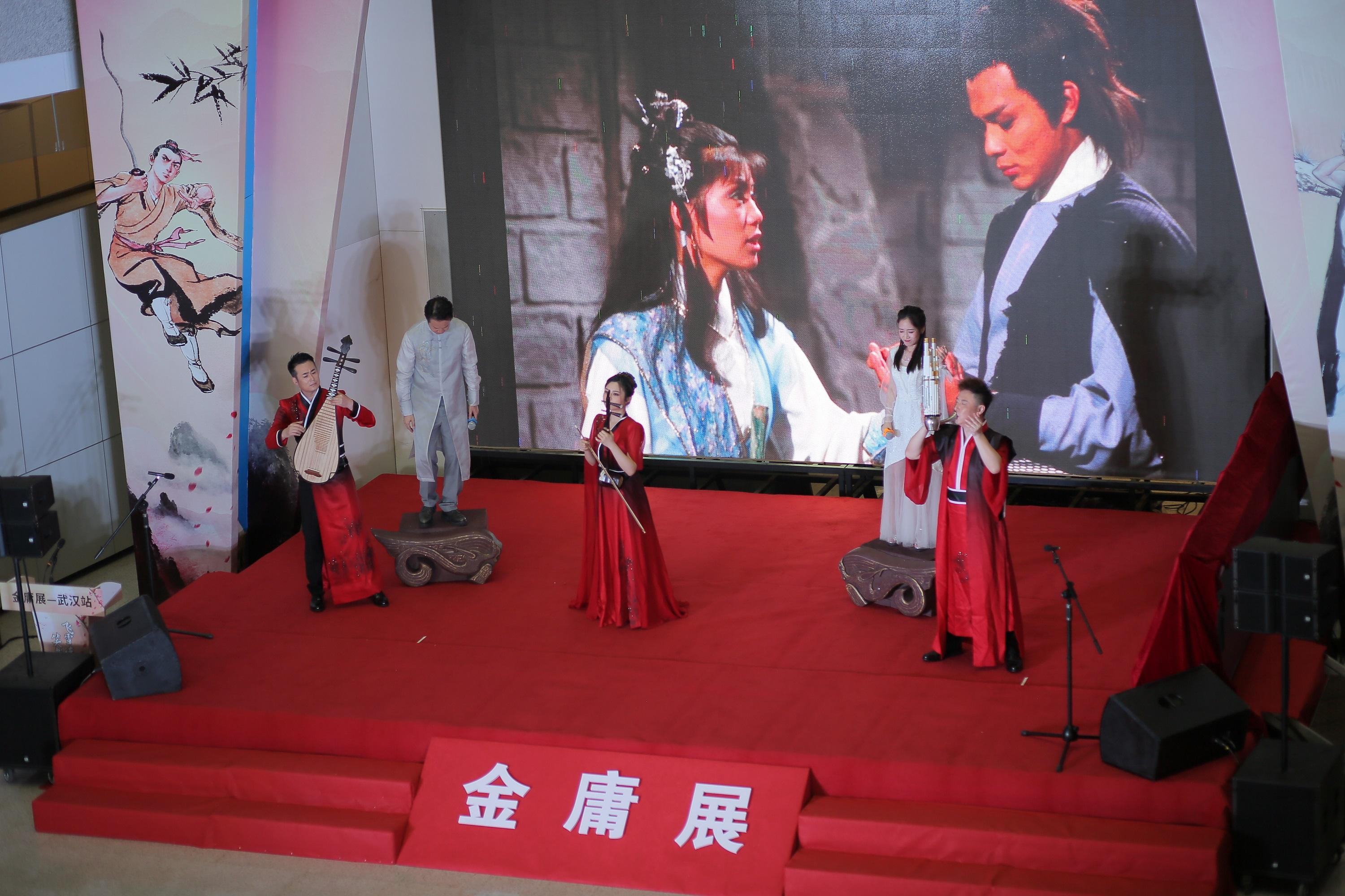 A themed exhibition on the veteran journalist and renowned writer, Dr Louis Cha (pen name Jin Yong), was officially opened today (September 9) at the Hubei Provincial Library in Wuhan. Photo shows a singing performance at opening ceremony of the Jin Yong exhibition.