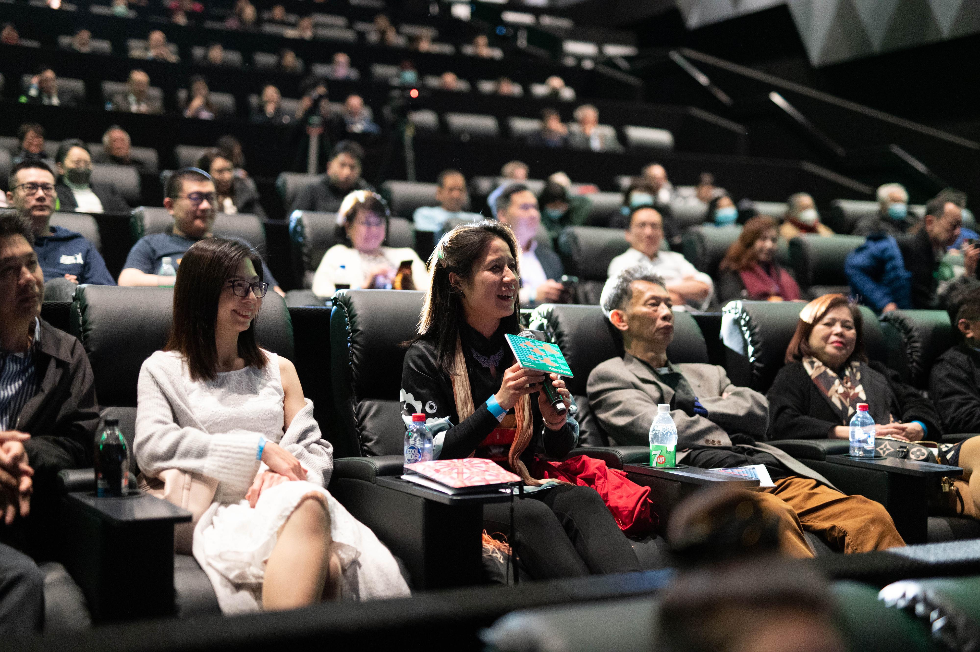 The Hong Kong Economic and Trade Office, Sydney supported the "Making Waves - Navigators of Hong Kong Cinema" to celebrate the 25th anniversary of the establishment of the Hong Kong Special Administrative Region. Photo shows Director Sunny Chan and actress Stephy Tang of Table for Six meets with the Sydney audience via a live holo-presence before the start of the screening.