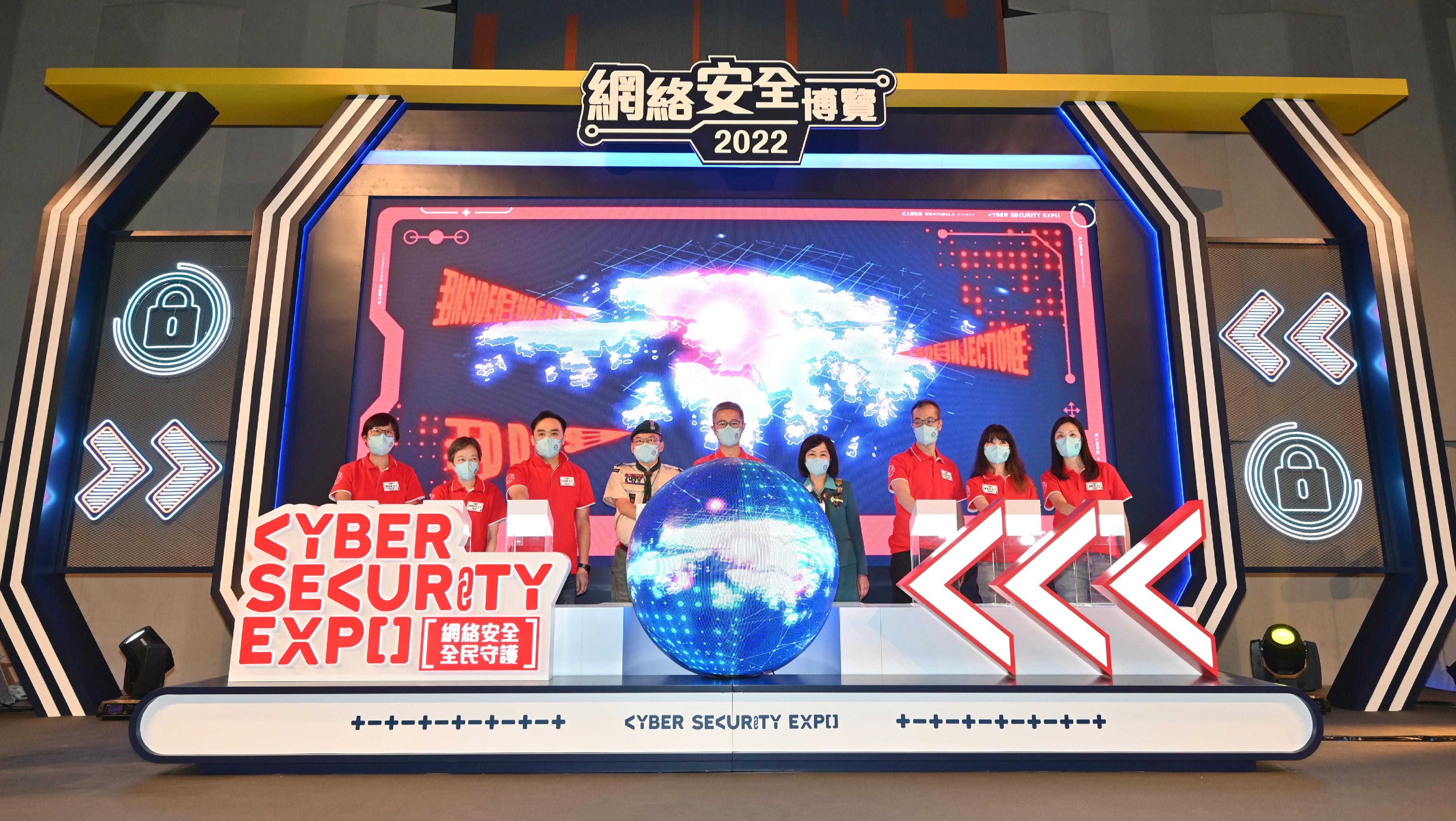 The Cyber Security Expo 2022 kicks off today (September 17). Photo shows the Commissioner of Police, Mr Siu Chak-yee (centre); the Chief Commissioner of the Scout Association of Hong Kong, Mr Joseph Lau (fourth left); the Chief Commissioner of the Hong Kong Girl Guides Association, Ms Jeanne Lee (fourth right); the Deputy Commissioner of Police (Operations), Mr Yuen Yuk-kin (third left); the Director of Crime and Security, Mr Yip Wan-lung (third right); the Deputy Secretary for Education, Mrs Hong Chan Tsui-wah (second left); the Deputy Head of Marketing of the Hong Kong Science and Technology Park Corporation, Ms Hilda Chan (second right); the Assistant Commissioner of Police (Crime), Ms Chung Wing-man (first left); and the Chief Superintendent of the Cyber Security and Technology Crime Bureau, Ms Cheng Lai-ki (first right), officiating at the opening ceremony.