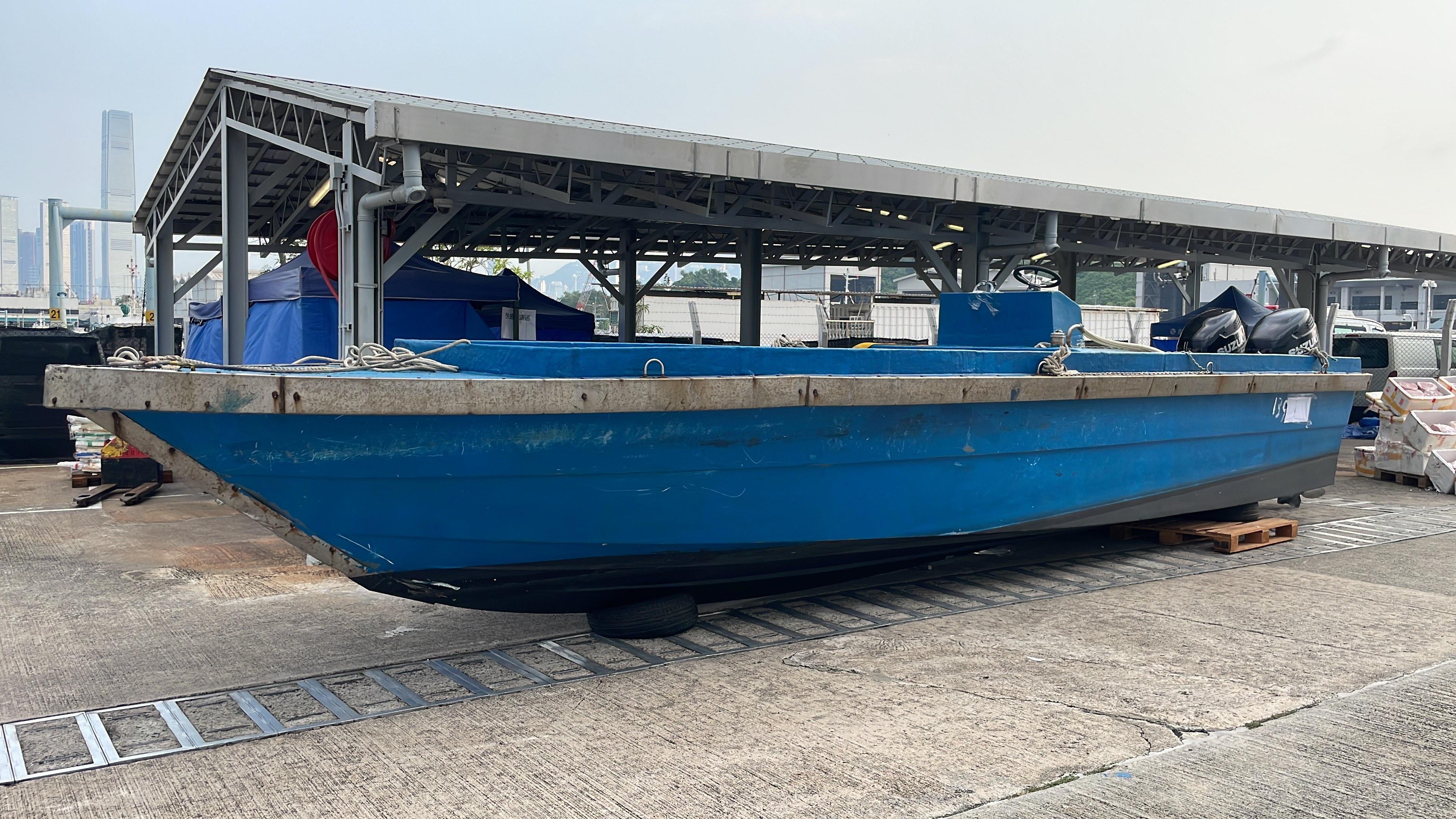 Hong Kong Customs yesterday (September 22) mounted an anti-smuggling operation in the waters near Shau Kei Wan and detected a suspected smuggling case involving a speedboat. A batch of suspected smuggled frozen Wagyu beef, with an estimated market value of about $4 million, was seized. Photo shows the speedboat, with two powerful mounted outboard engines, seized by Customs officers. 