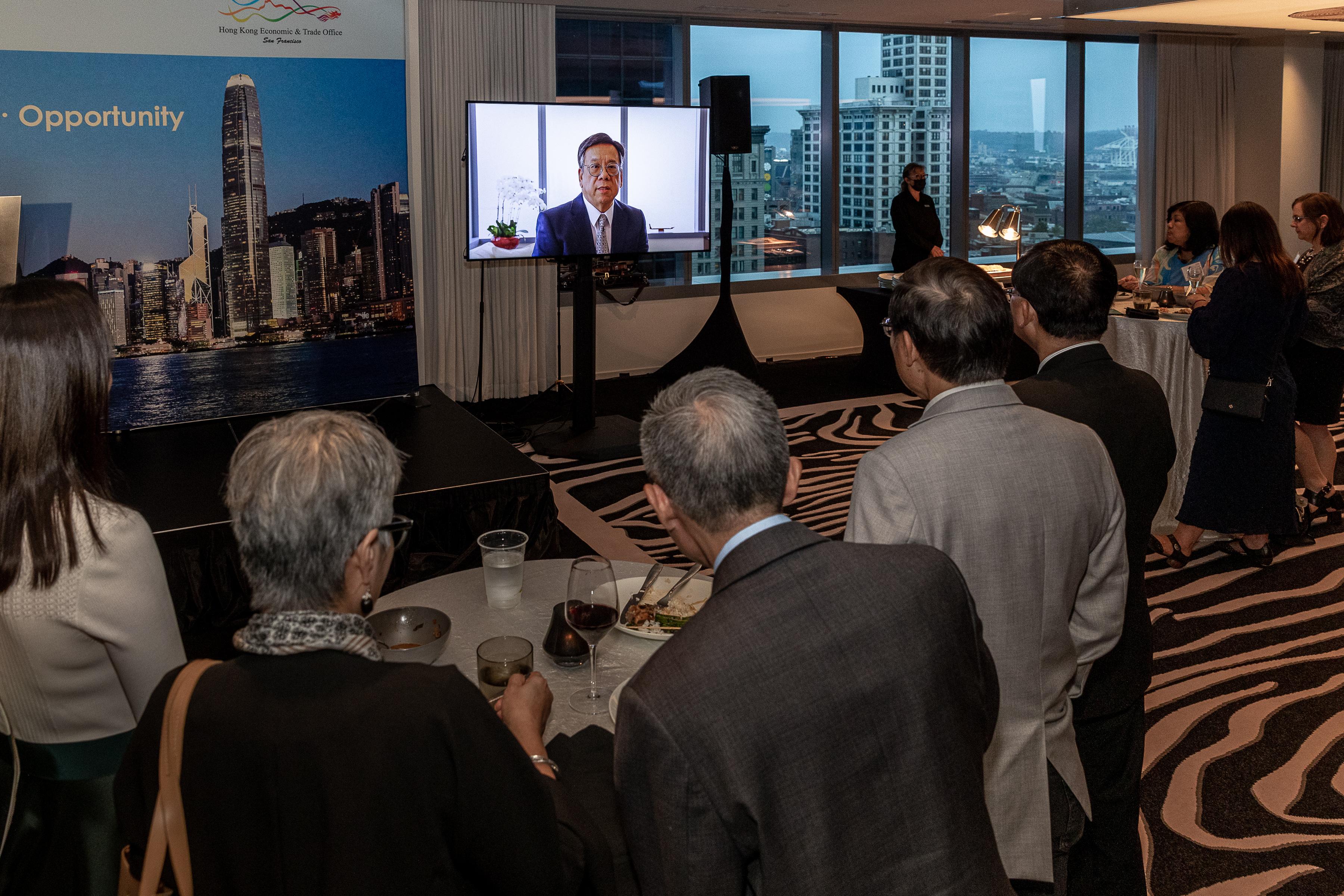 The Secretary for Commerce and Economic Development, Mr Algernon Yau, delivers a pre-recorded keynote speech at a reception celebrating the 25th anniversary of the establishment of the Hong Kong Special Administrative Region in Seattle, Washington, on September 15 (Seattle time).
