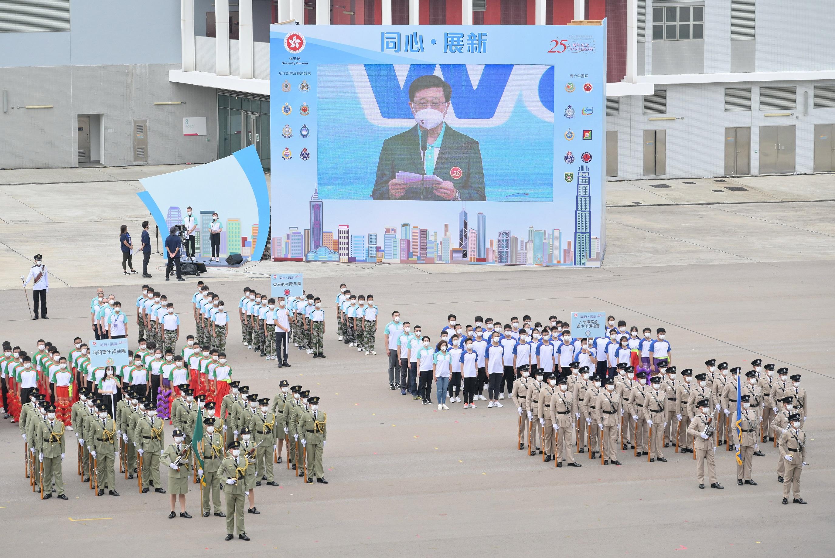 The Security Bureau led the disciplined services, auxiliary services and nine youth groups to hold the "Together We Prosper" Grand Parade by Disciplined Services and Youth Groups for Celebrating the 73rd Anniversary of the Founding of the People’s Republic of China and the 25th Anniversary of the Establishment of the Hong Kong Special Administrative Region at the Fire and Ambulance Services Academy in Tseung Kwan O today (September 24). Photo shows the Chief Executive, Mr John Lee delivering the speech at the grand parade.