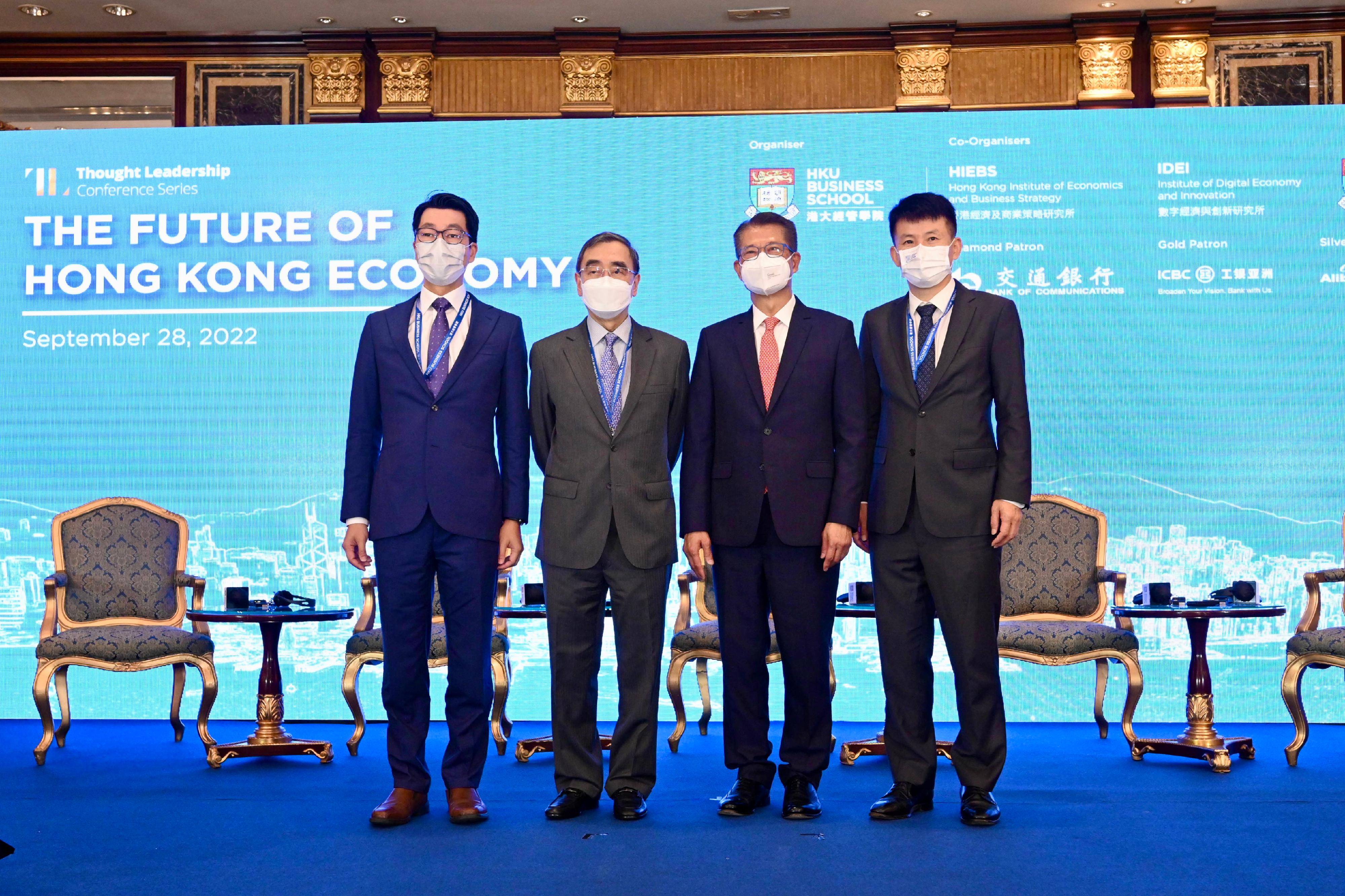 The Financial Secretary, Mr Paul Chan, attended the conference on "The Future of Hong Kong Economy" organised by the University of Hong Kong (HKU) Business School today (September 28). Photo shows (from left) Professor in Economics of the HKU Business School and Associate Director of the Hong Kong Institute of Economics and Business Strategy (HIEBS) Professor Tang Heiwai; the Provost and Deputy Vice-Chancellor of HKU and Director of HIEBS, Professor Richard Wong; Mr Chan; and the Dean of the HKU Business School, Professor Cai Hongbin.