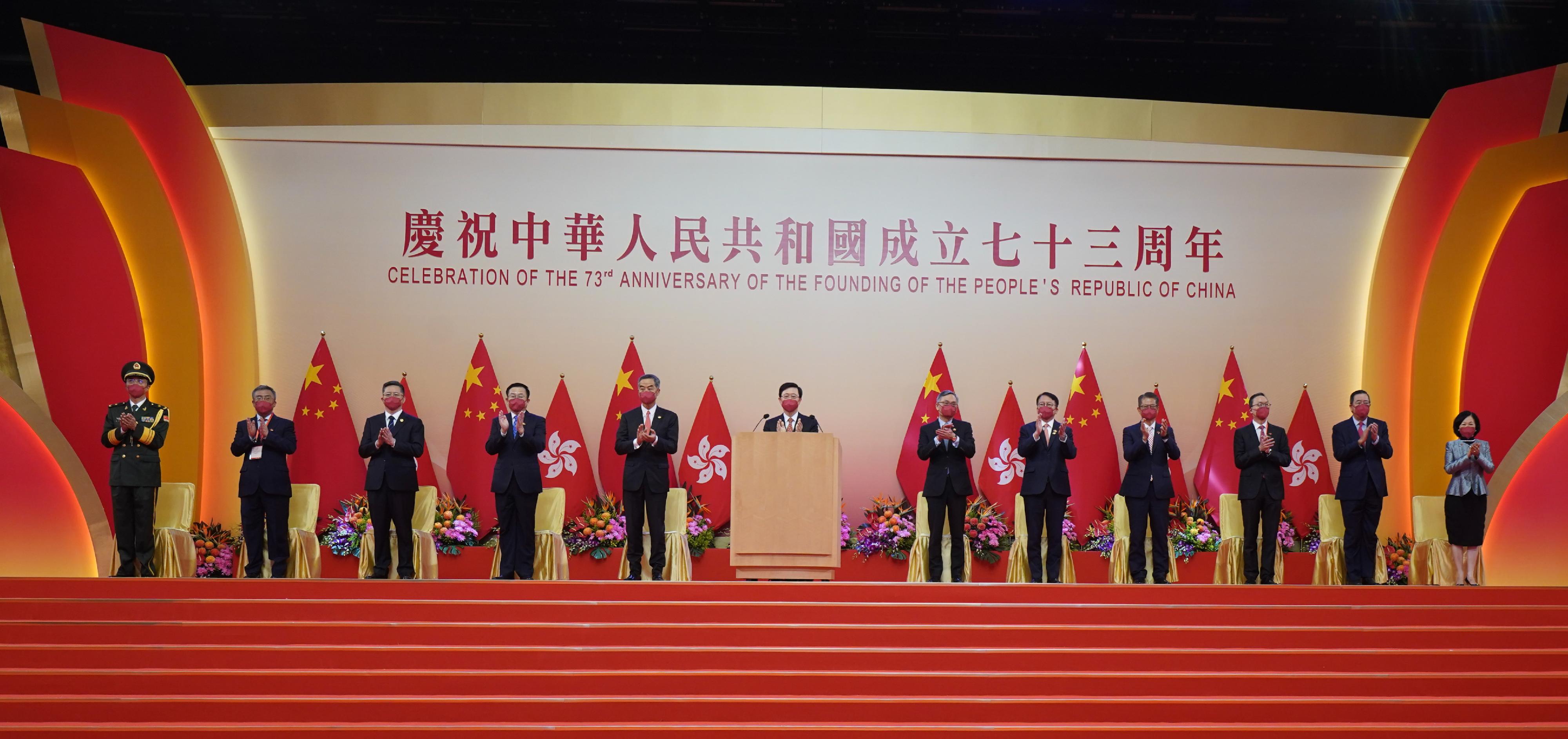 
The Chief Executive, Mr John Lee, together with Principal Officials and guests, attended the reception for the 73rd anniversary of the founding of the People's Republic of China at the Hong Kong Convention and Exhibition Centre this morning (October 1). Photo shows (from left) Deputy Commander of the Chinese People's Liberation Army Hong Kong Garrison Major General Zheng Guoyue; the Acting Commissioner of the Ministry of Foreign Affairs of the People's Republic of China in the Hong Kong Special Administrative Region (HKSAR), Mr Yang Yirui; Deputy Head of the Office for Safeguarding National Security of the Central People's Government in the HKSAR Mr Li Jiangzhou; Deputy Director of the Liaison Office of the Central People's Government in the HKSAR Mr He Jing; Vice-Chairman of the National Committee of the Chinese People's Political Consultative Conference Mr C Y Leung; Mr Lee; the Chief Justice of the Court of Final Appeal, Mr Andrew Cheung Kui-nung; the Chief Secretary for Administration, Mr Chan Kwok-ki; the Financial Secretary, Mr Paul Chan; the Secretary for Justice, Mr Paul Lam, SC; the President of the Legislative Council, Mr Andrew Leung; and the Convenor of the Non-official Members of the Executive Council, Mrs Regina Ip, proposing a wish at the wish-making ceremony.