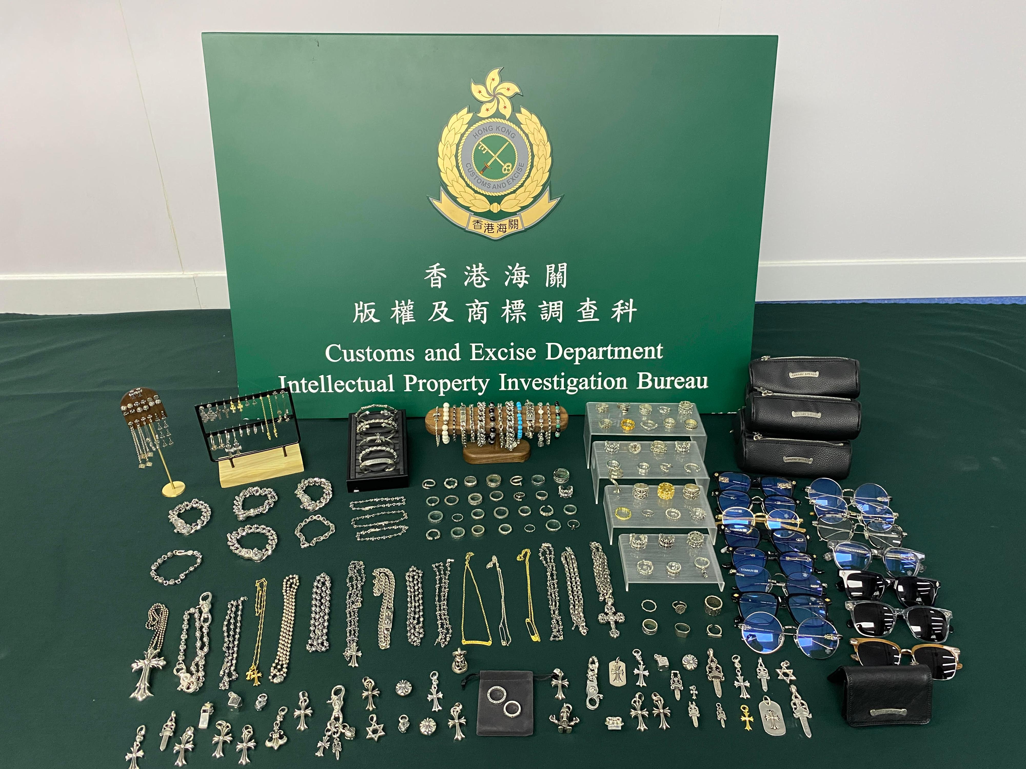 Hong Kong Customs yesterday (October 6) conducted an enforcement operation to combat the online sale of counterfeit accessories and seized about 240 suspected counterfeit products with an estimated market value of about $240,000 in a retail shop. Photo shows the suspected counterfeit accessories seized. 