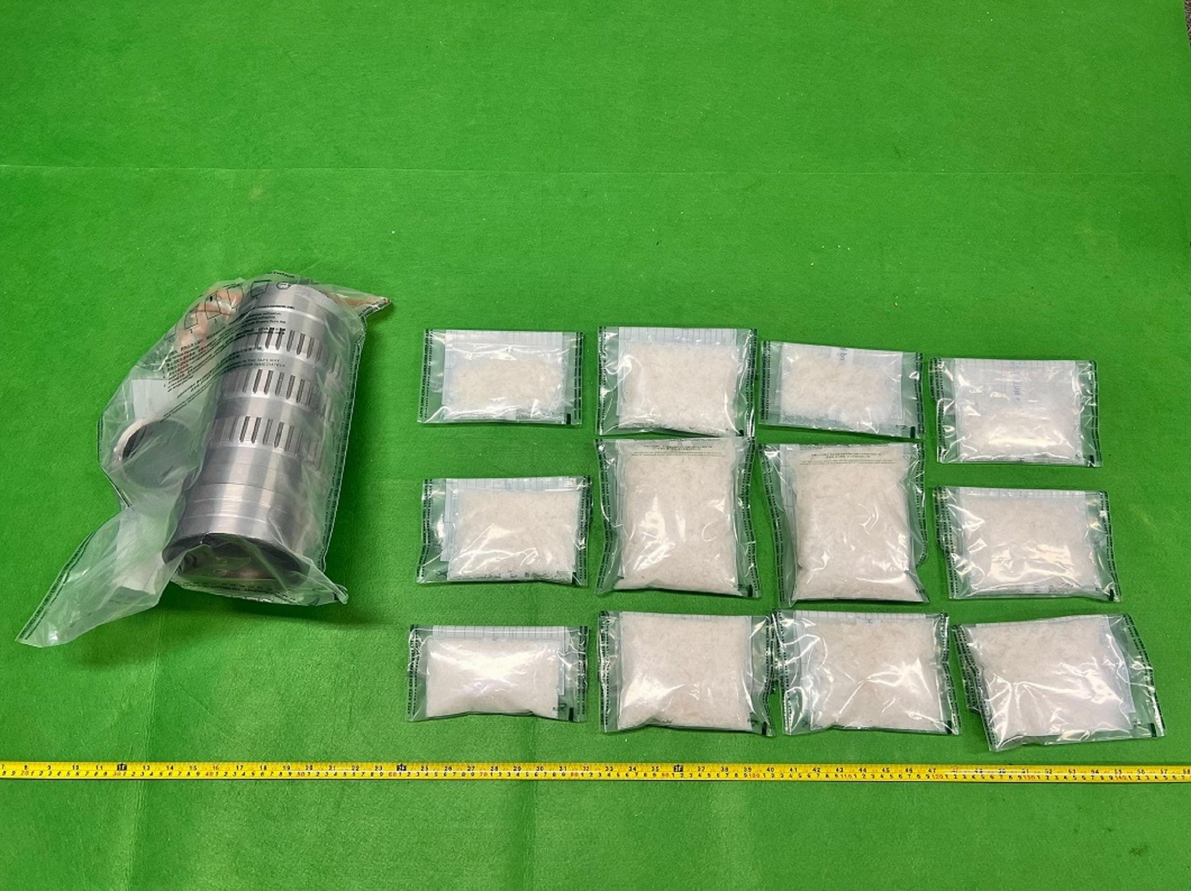 Hong Kong Customs on October 11 seized about 2.2 kilograms of suspected methamphetamine with an estimated market value of about $1.34 million at Hong Kong International Airport. Photo shows the suspected methamphetamine seized and the metal gearbox used to conceal the drugs.