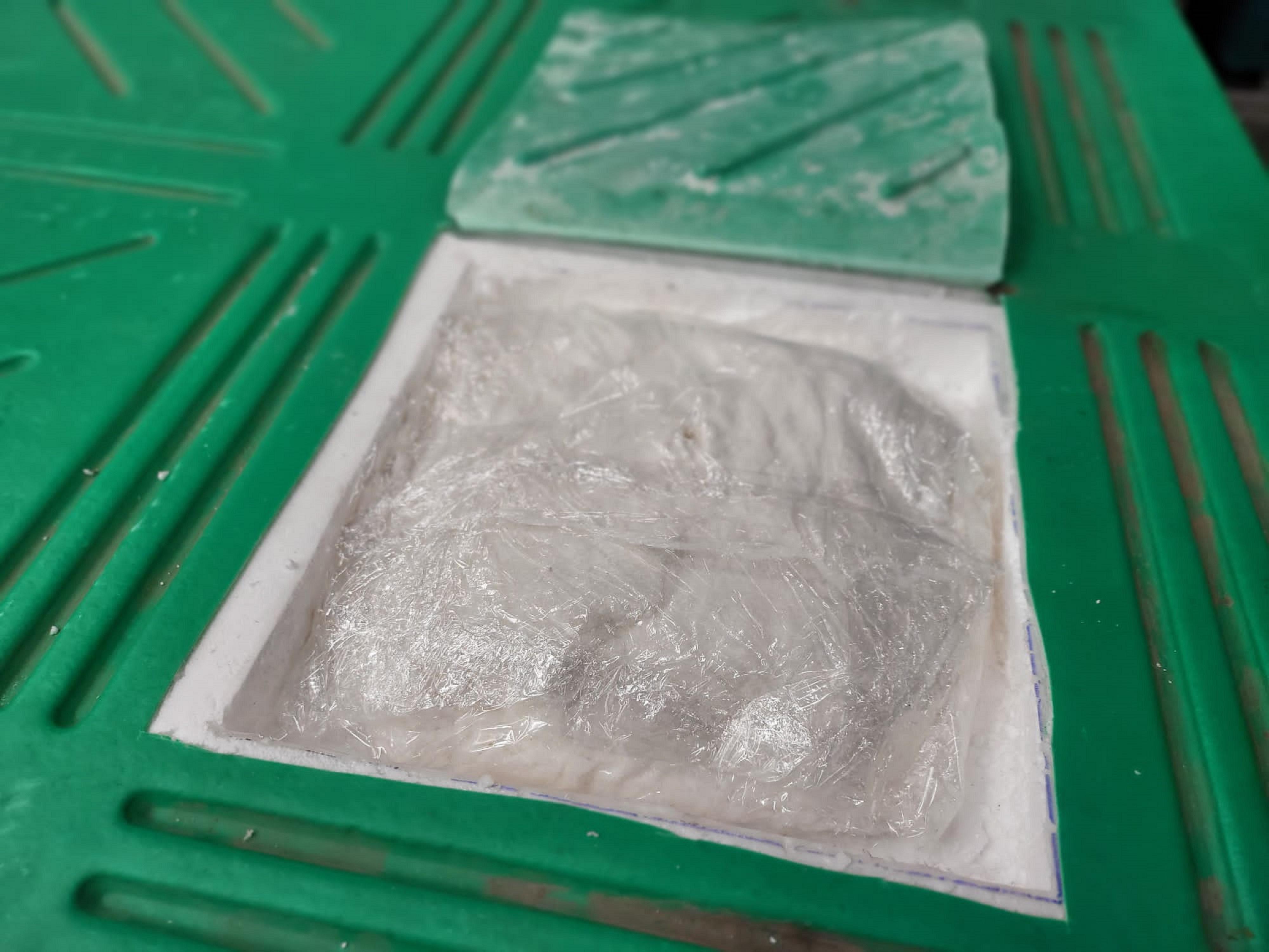 Hong Kong Customs today (October 17) seized about 11 kilograms of suspected ketamine with an estimated market value of about $6.3 million at Hong Kong International Airport. Photo shows some of the suspected ketamine concealed inside a plastic pallet.