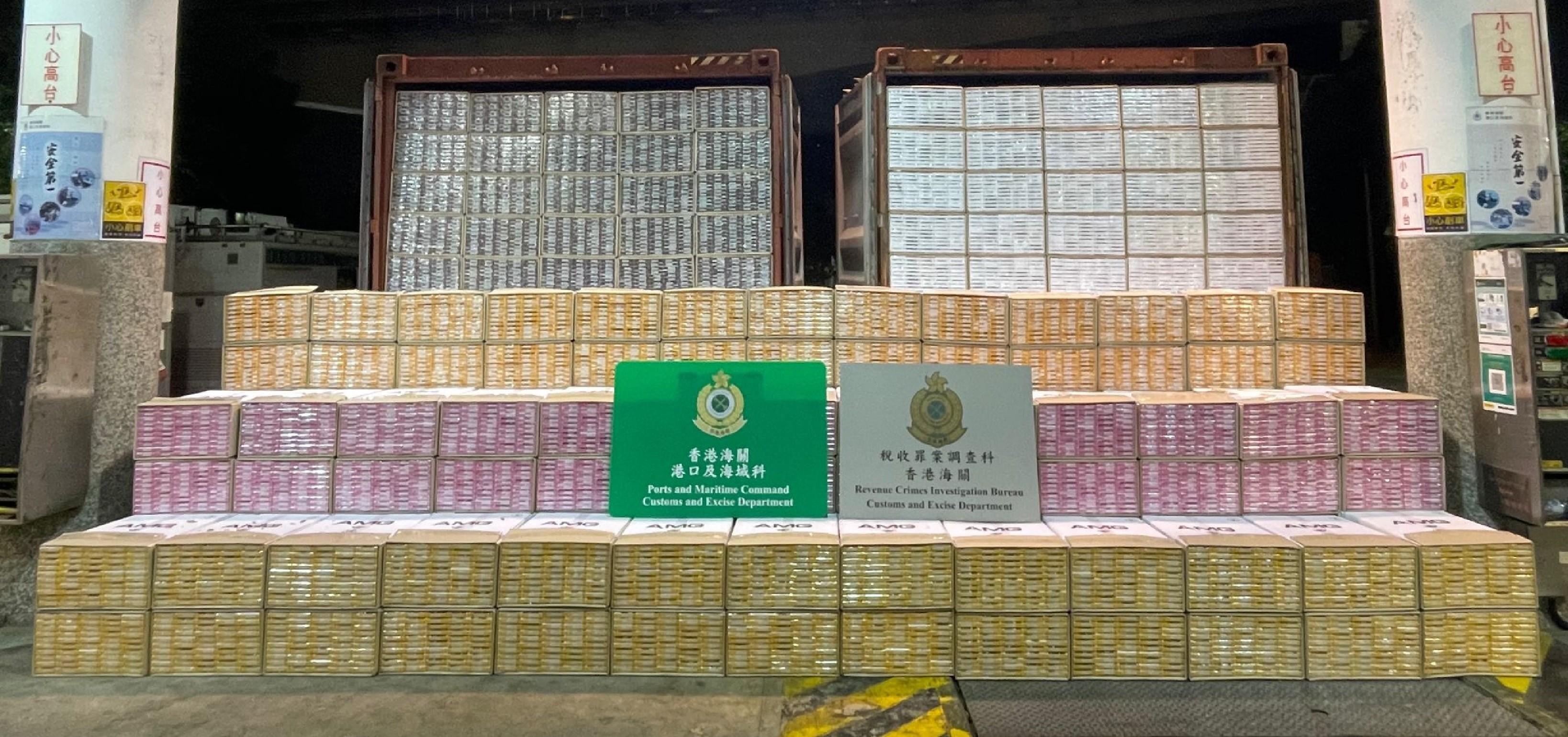 Hong Kong Customs detected two large-scale illicit cigarette smuggling cases on October 14 and 15 with a total seizure of about 43 million suspected illicit cigarettes made in Yau Ma Tei, San Tin and Tsing Yi. The estimated market value was about $120 million, with a duty potential of about $81 million. Photo shows the suspected illicit cigarettes seized by Customs officers on board a barge. The total number was about 20 million.