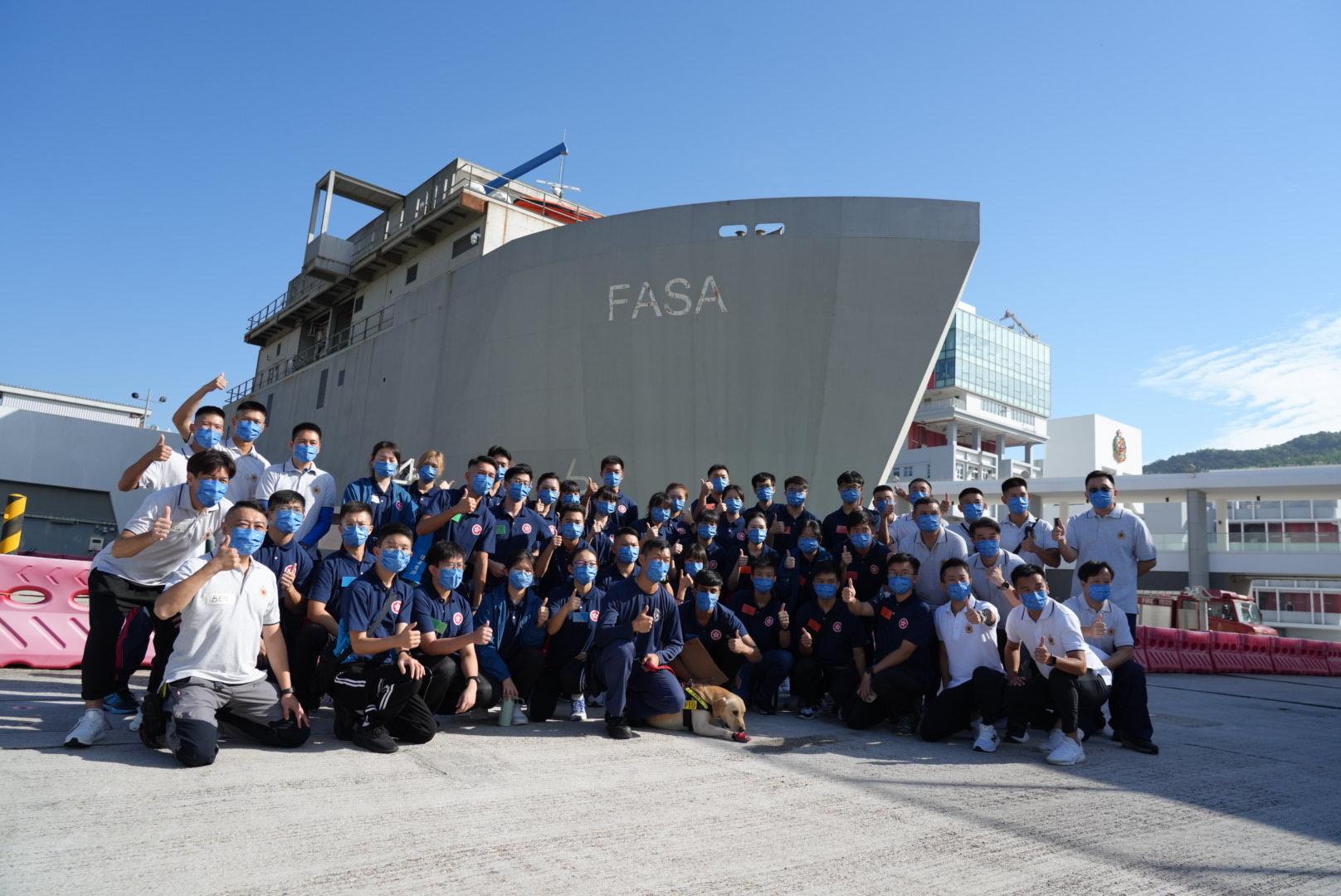 The Security Bureau today (October 22) held a two-day, one-night induction course at the Fire and Ambulance Services Academy (FASA) in Tseung Kwan O for members of the Security Bureau Youth Uniformed Group Leaders Forum. Photo shows members of the Leaders Forum taking a group photo at the FASA.