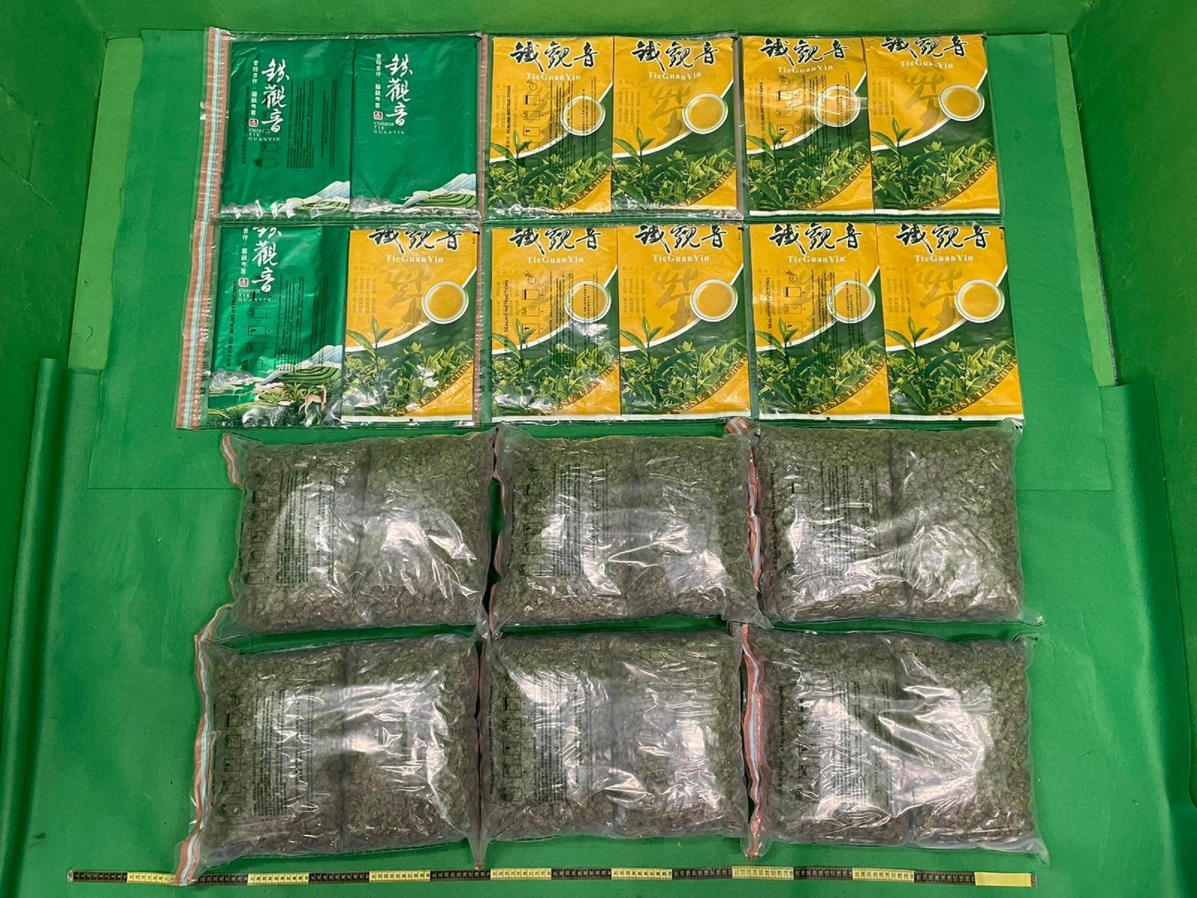 Hong Kong Customs detected five dangerous drugs cases, in which local freight consolidators were being exploited, at Hong Kong International Airport between end-July and mid-October this year and seized about 29 kilograms of suspected methamphetamine and about 12kg of suspected cannabis buds with a total estimated market value of about $20 million. Photo shows the suspected cannabis buds seized in the fourth and fifth cases and the tea leaf packaging bags used to conceal the drugs.