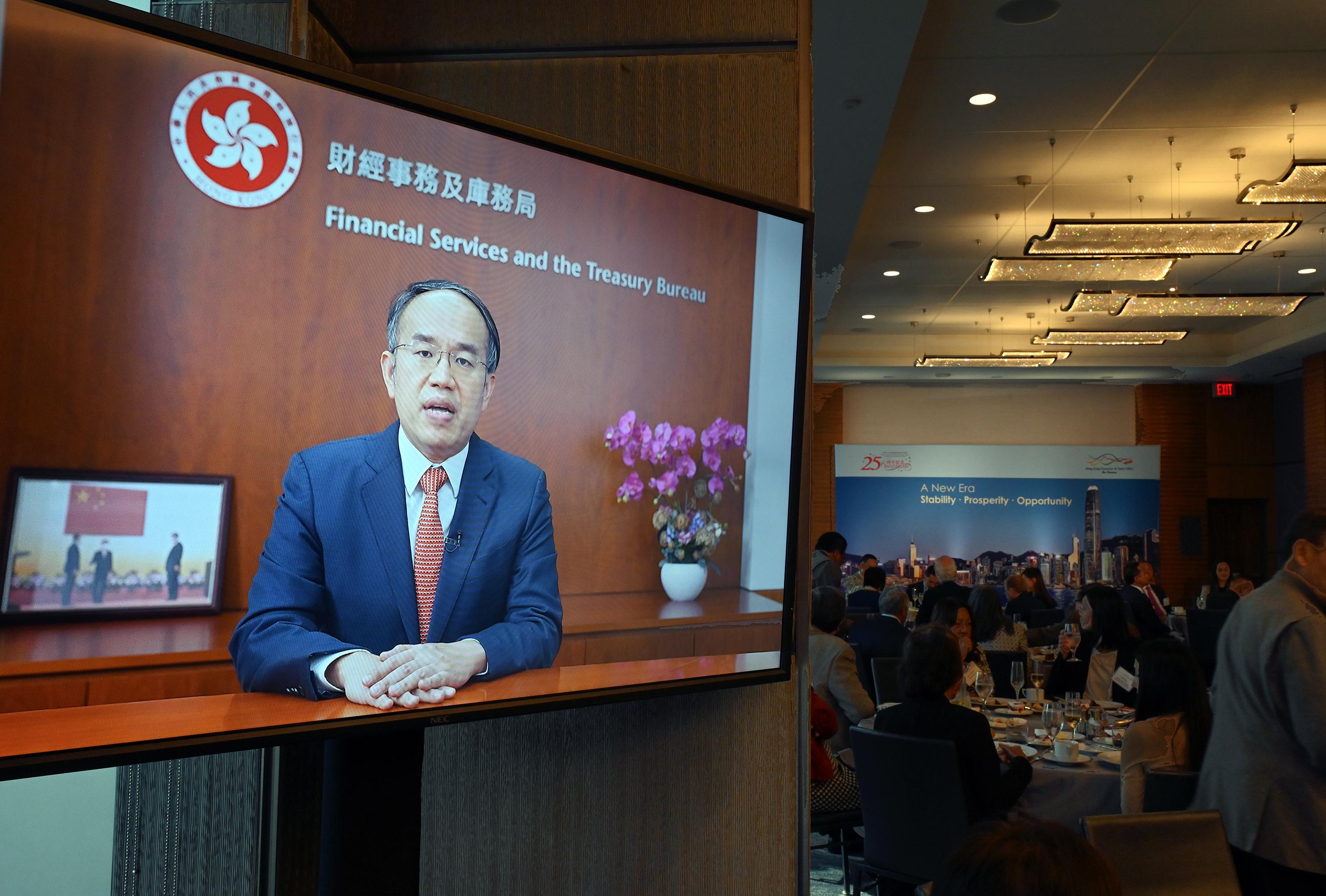 The Secretary for Financial Services and the Treasury, Mr Christopher Hui, delivers a video keynote address at a business luncheon celebrating the 25th anniversary of the establishment of the Hong Kong Special Administrative Region. The event was held in Los Angeles, California, on October 26 (Los Angeles time).
