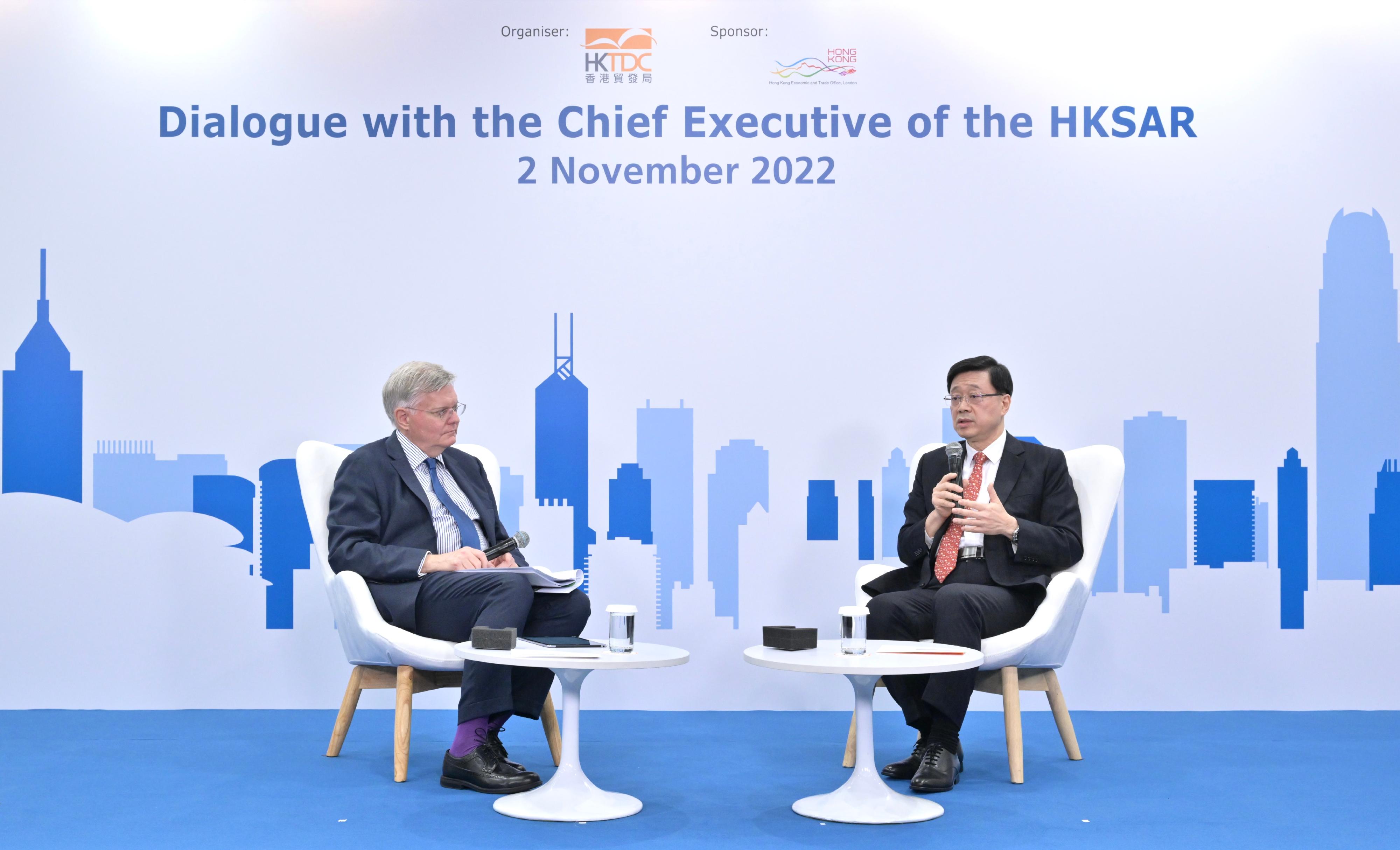 The Chief Executive, Mr John Lee (right), attended the "Dialogue with the Chief Executive of the HKSAR" webinar organised by the Hong Kong Trade Development Council today (November 2).