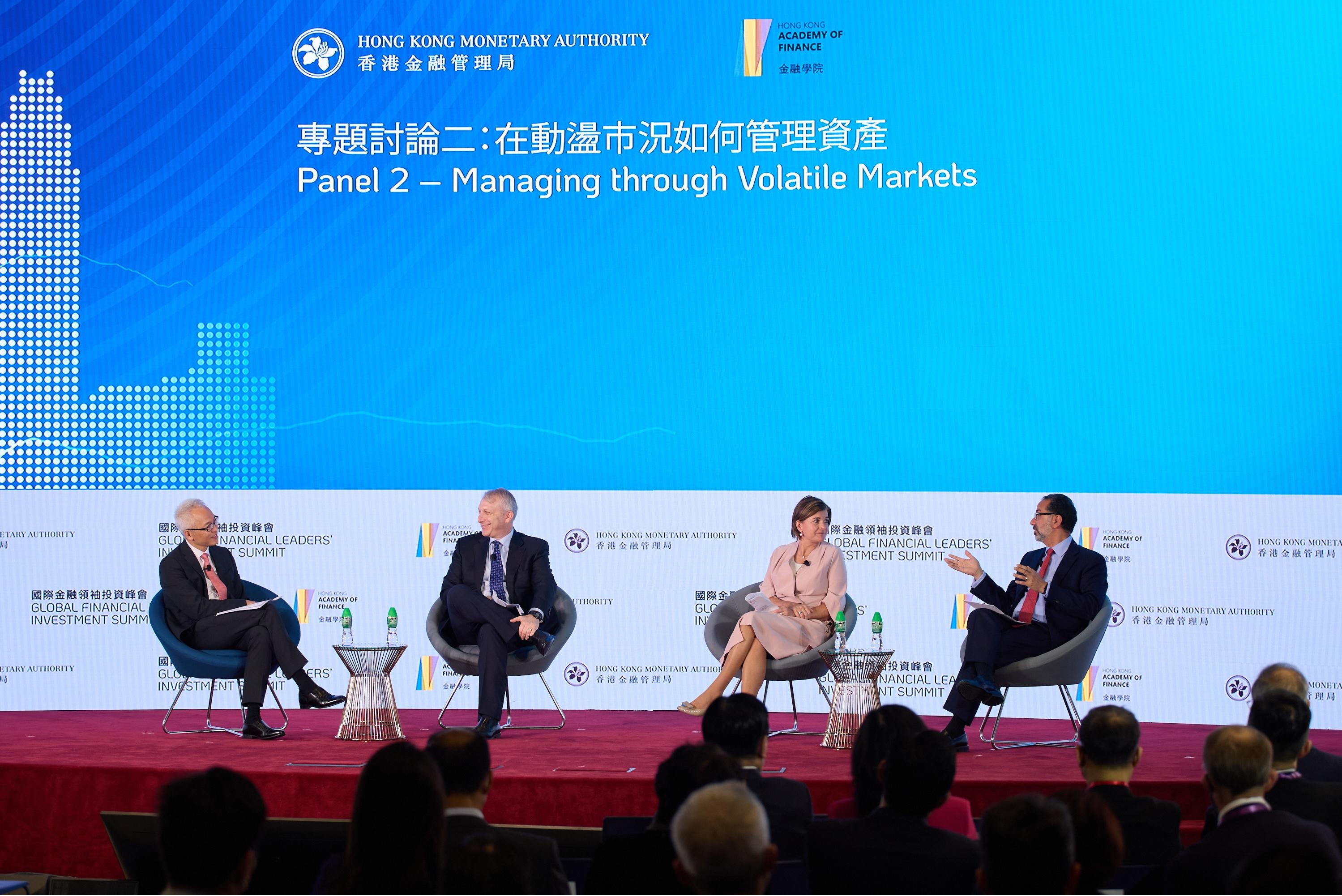 Deputy Chief Executive of the Hong Kong Monetary Authority Mr Howard Lee (first left) moderates a panel discussion on "Managing through Volatile Markets" at the "Conversations with Global Investors" seminar of the Global Financial Leaders' Investment Summit today (November 3), and is joined by (from second left) President and Managing Partner of Wellington Management Mr Stephen Klar; Chief Executive Officer of BNY Mellon Investment Management Ms Hanneke Smits; and President and CEO of State Street Global Advisors Mr Cyrus Taraporevala.