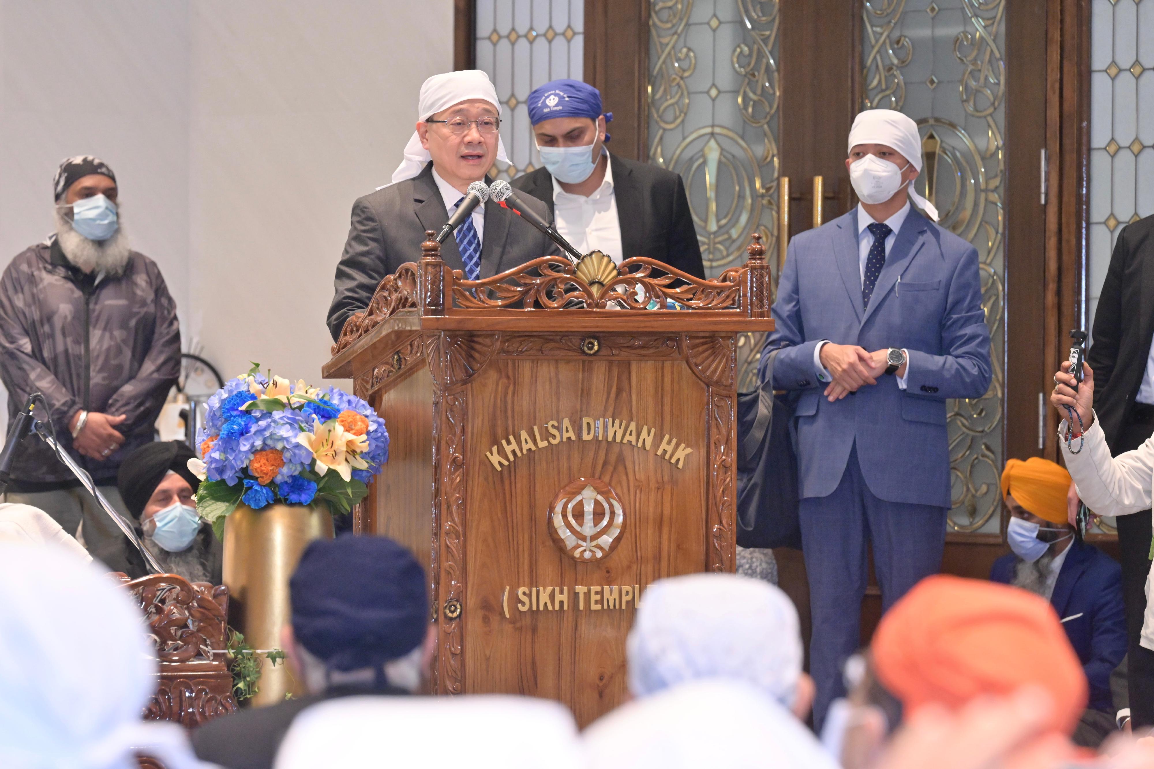 The Chief Executive, Mr John Lee, speaks at the opening ceremony of the new Sikh Temple today (November 8).