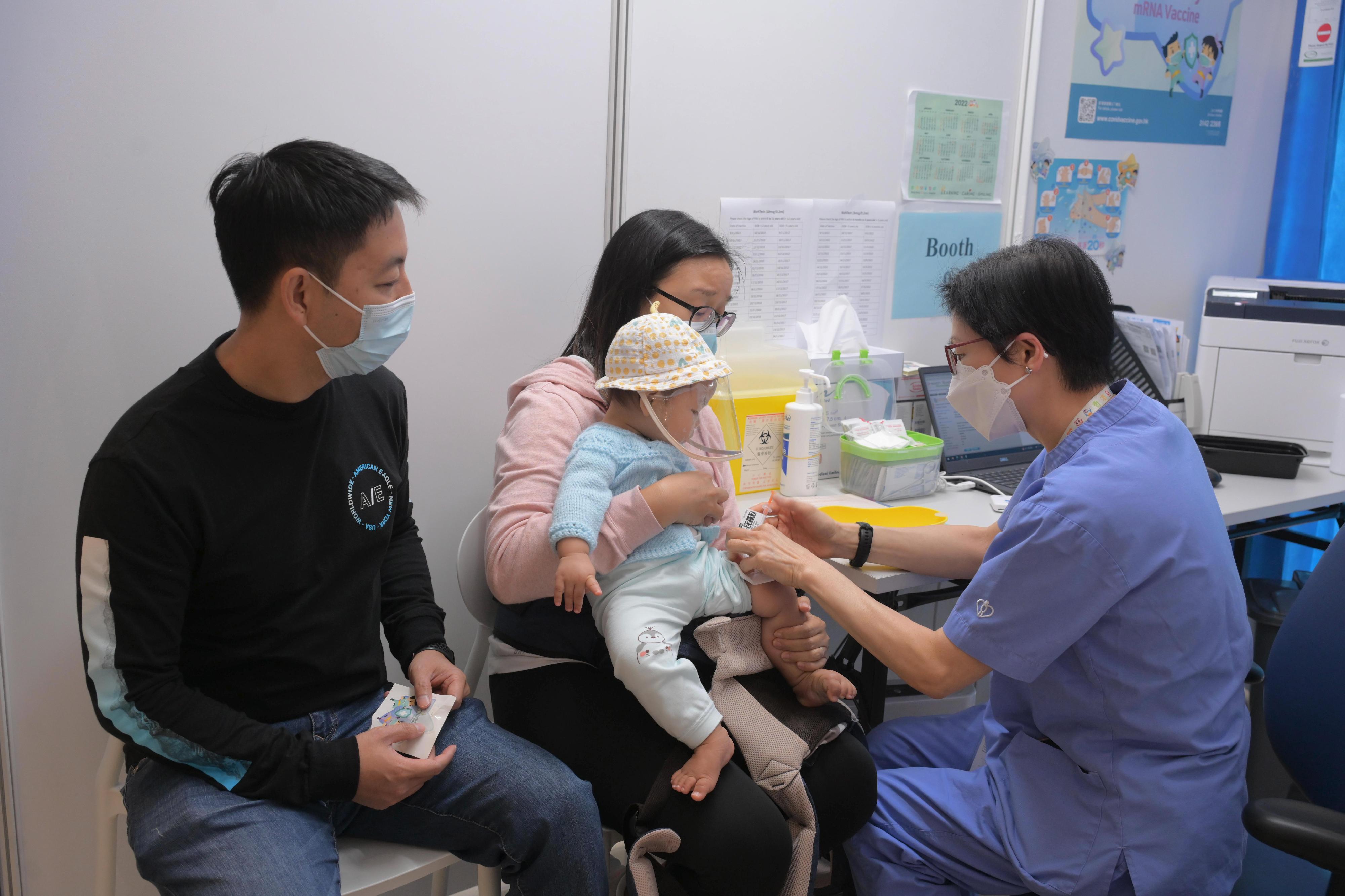 Starting from today (November 9), children aged between 6 months and 4 years could receive free vaccination of toddler formulation of the BioNTech vaccine at the four Children Community Vaccination Centres (CCVCs). Photo shows a child receiving vaccination of toddler formulation of the BioNTech vaccine at Hong Kong Children's Hospital CCVC. 