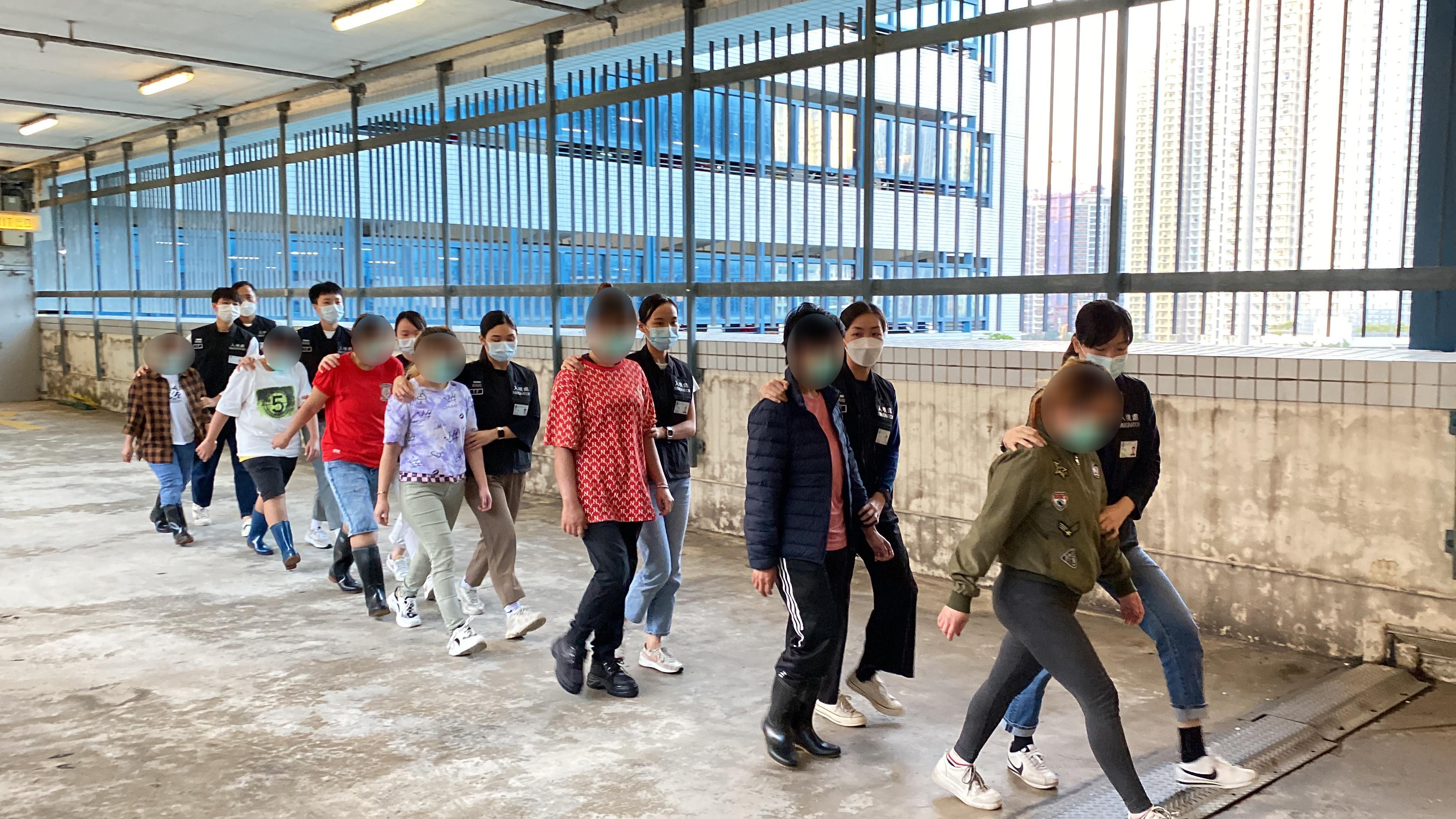 The Immigration Department mounted a series of    territory-wide anti-illegal worker operations codenamed "Breakthrough" and "Twilight" for four consecutive days from November 6 to today (November 9). Photo shows suspected illegal workers arrested during an operation.