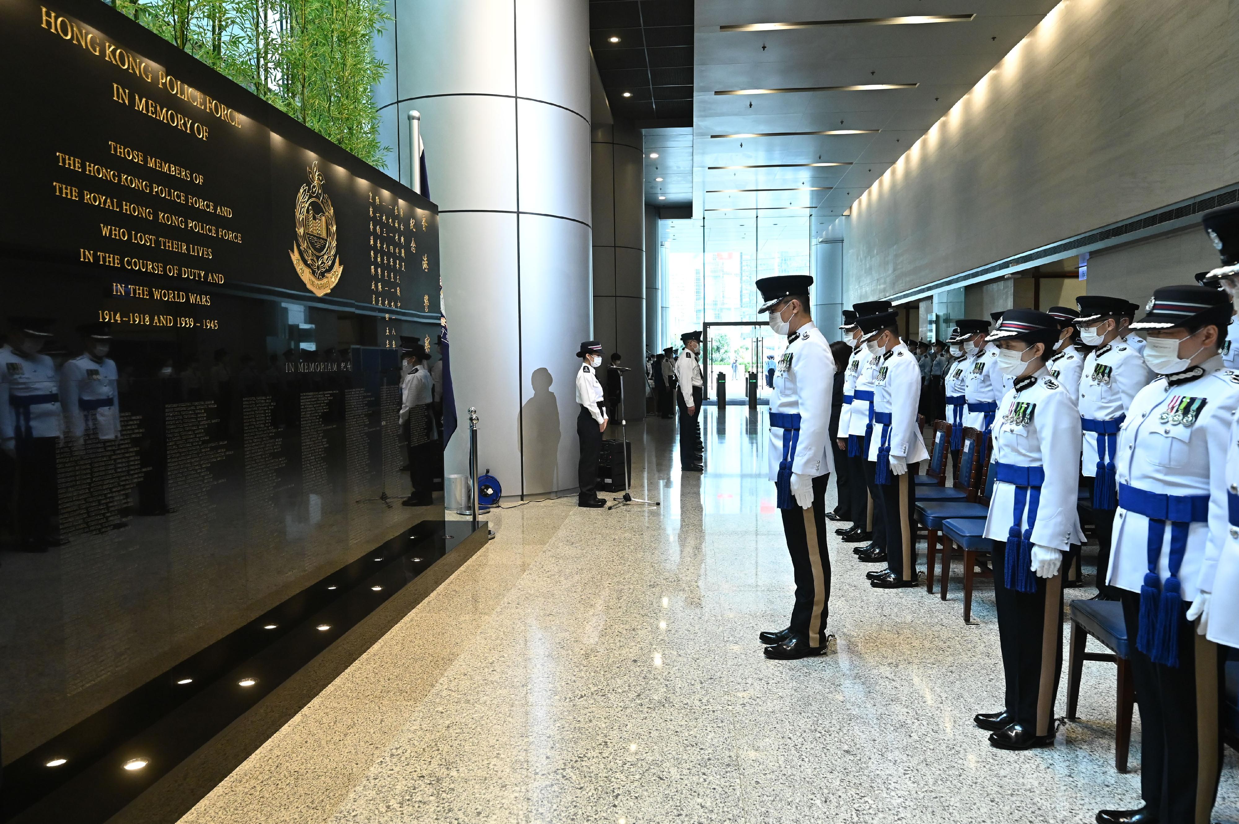 The Hong Kong Police Force holds a ceremony at the Police Headquarters this morning (November 11) to pay tribute to members of the Hong Kong Police Force and Hong Kong Auxiliary Police Force who have given their lives in the line of duty. Photo shows the Commissioner of Police, Mr Siu Chak-yee, and the Commissioner Rank Officers attending the ceremony in front of the new Force Memorial Wall at the 3/F foyer of Arsenal House.