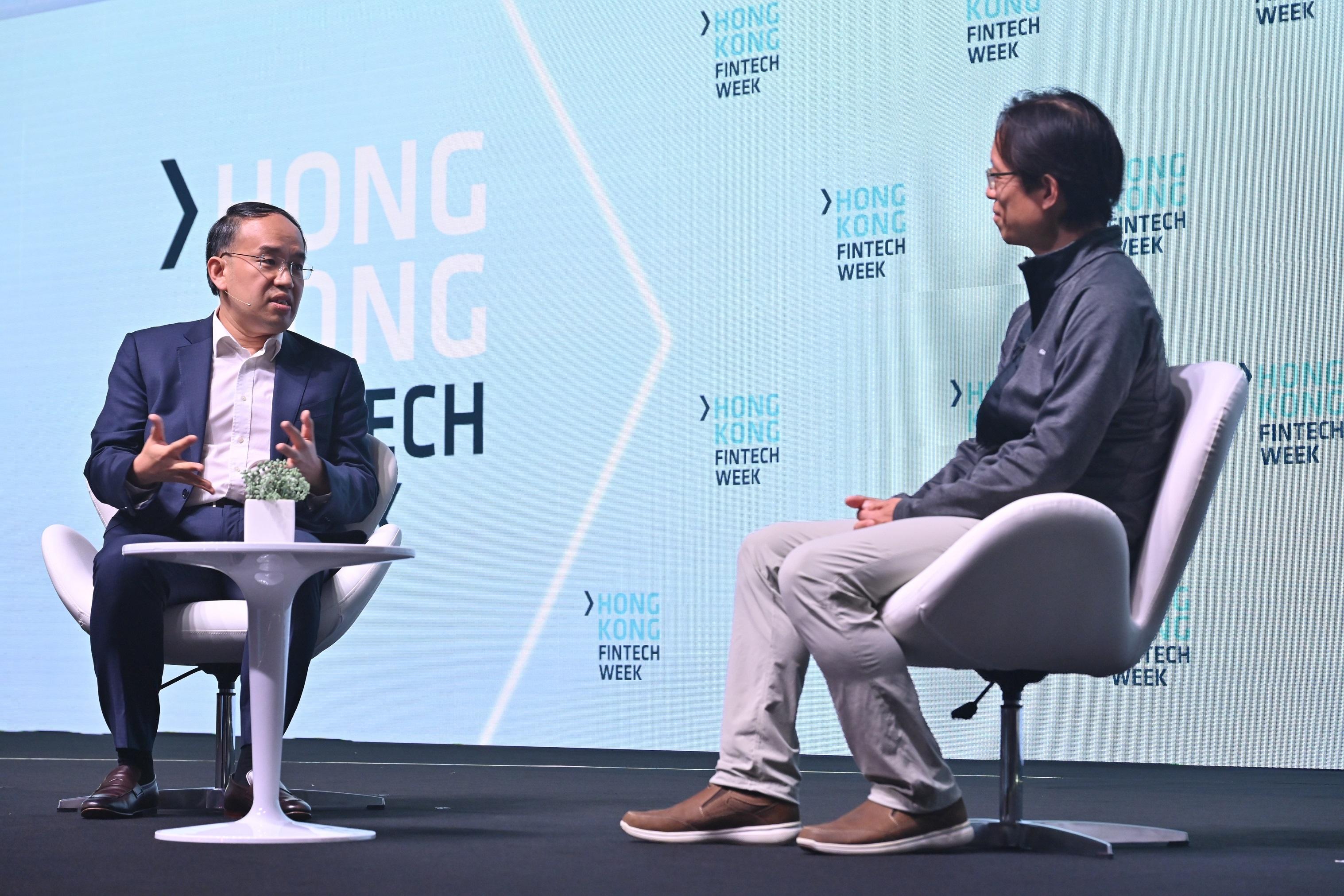 The five-day Hong Kong FinTech Week 2022 attracted over 30 000 visitors and more than five million online views from over 95 economies. Photo shows the Secretary for Financial Services and the Treasury, Mr Christopher Hui (left), and the Co-Founder and Executive Chairman of Animoca Brands, Mr Yat Siu (right), during a Fireside Chat on October 31, discussing how Hong Kong’s rapid technology adoption serves as a unique advantage.