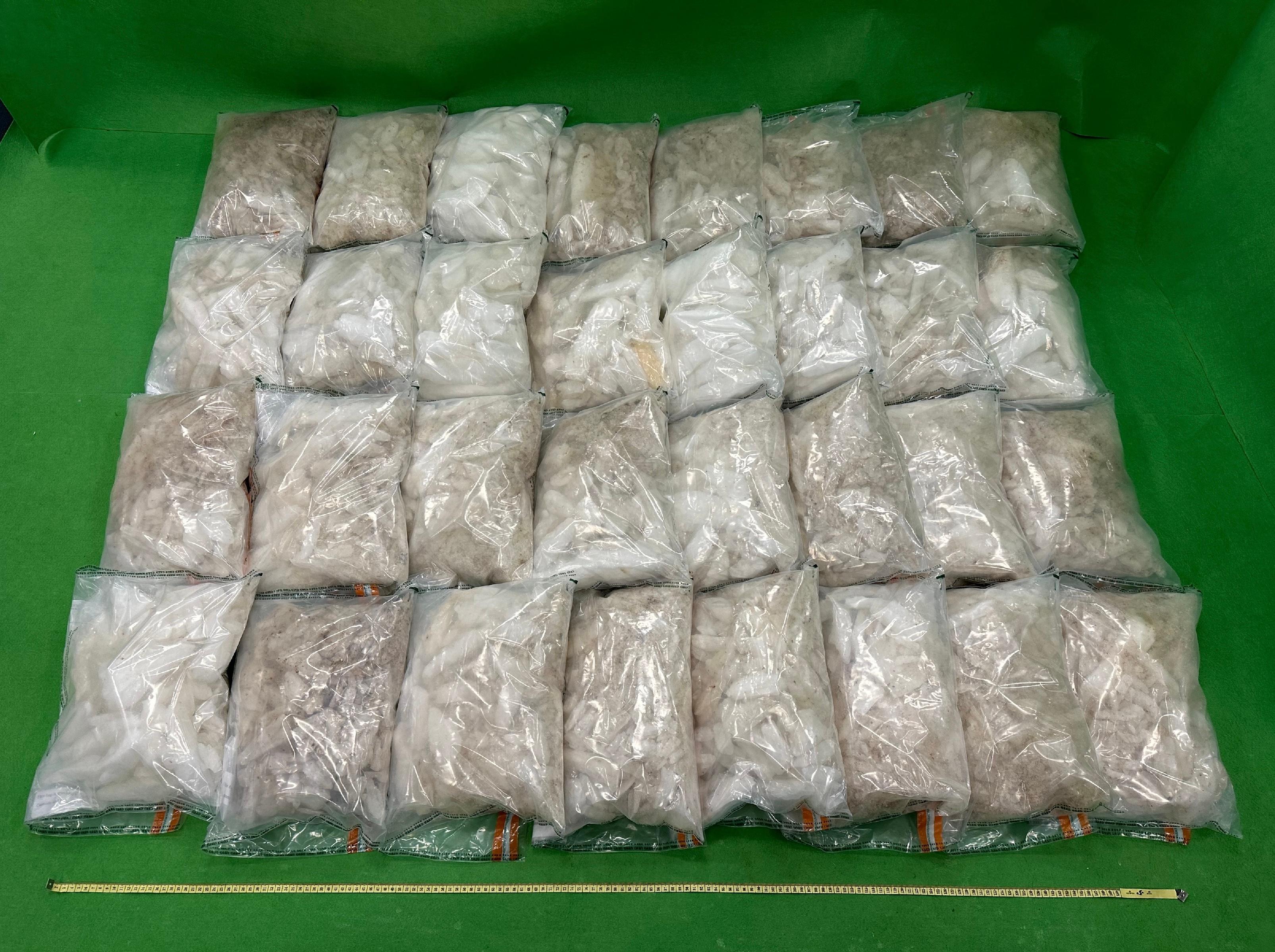 Hong Kong Customs on October 24 detected a large-scale methamphetamine trafficking case at Hong Kong International Airport and seized about 100 kilograms of suspected methamphetamine, with an estimated market value of about $60 million, inside a suspended electromagnetic separator. Photo shows the suspected methamphetamine seized.