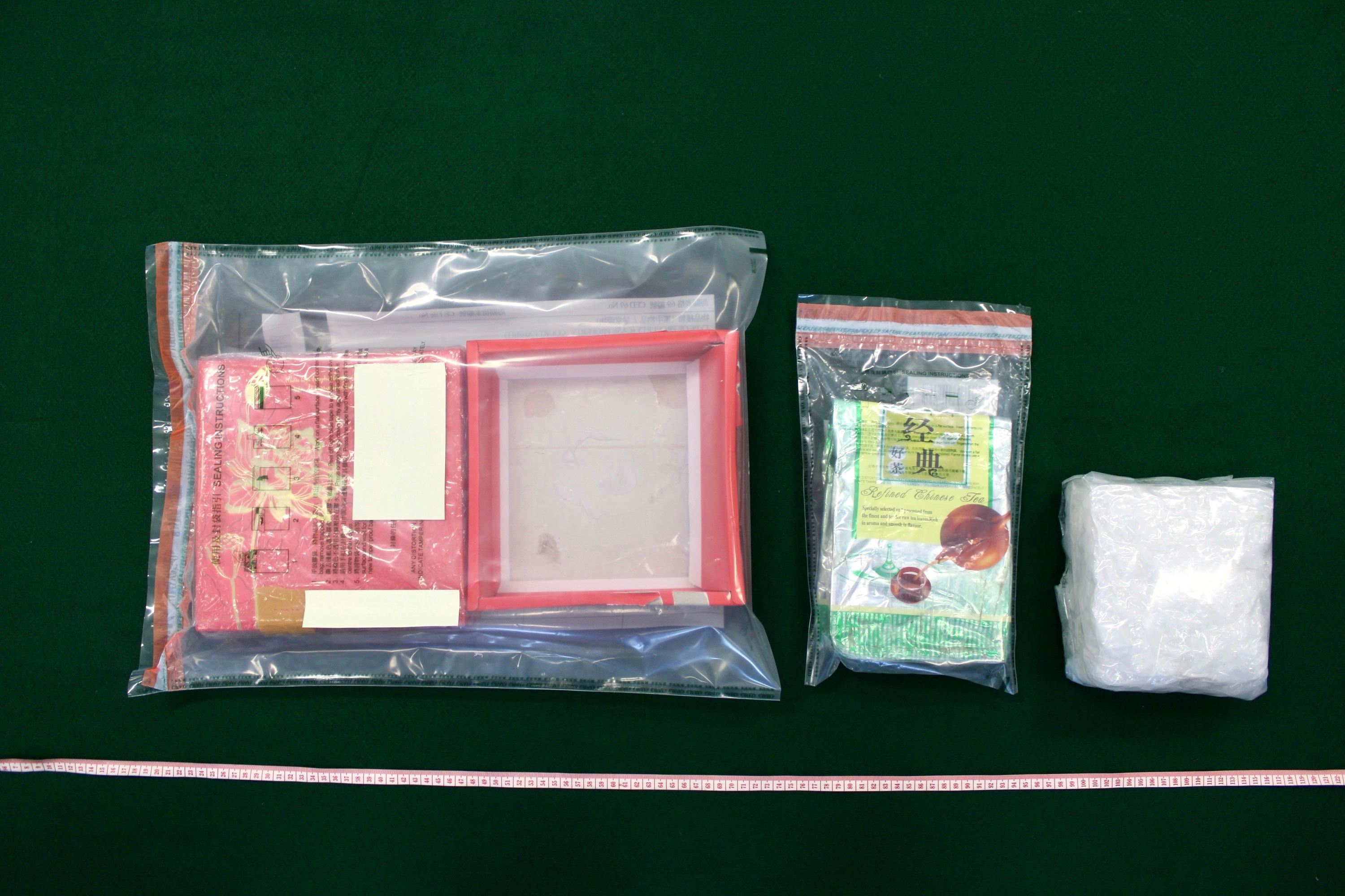 Hong Kong Customs detected two dangerous drugs cases on November 11 and 14, and seized about 8 kilograms of suspected methamphetamine and about 14kg of suspected heroin in Kwai Chung and Tin Shui Wai respectively, with a total estimated market value of about $17 million. Photo shows a biscuit gift set used to conceal the drugs, which contained a tea leaf packaging bag with suspected methamphetamine concealed inside.