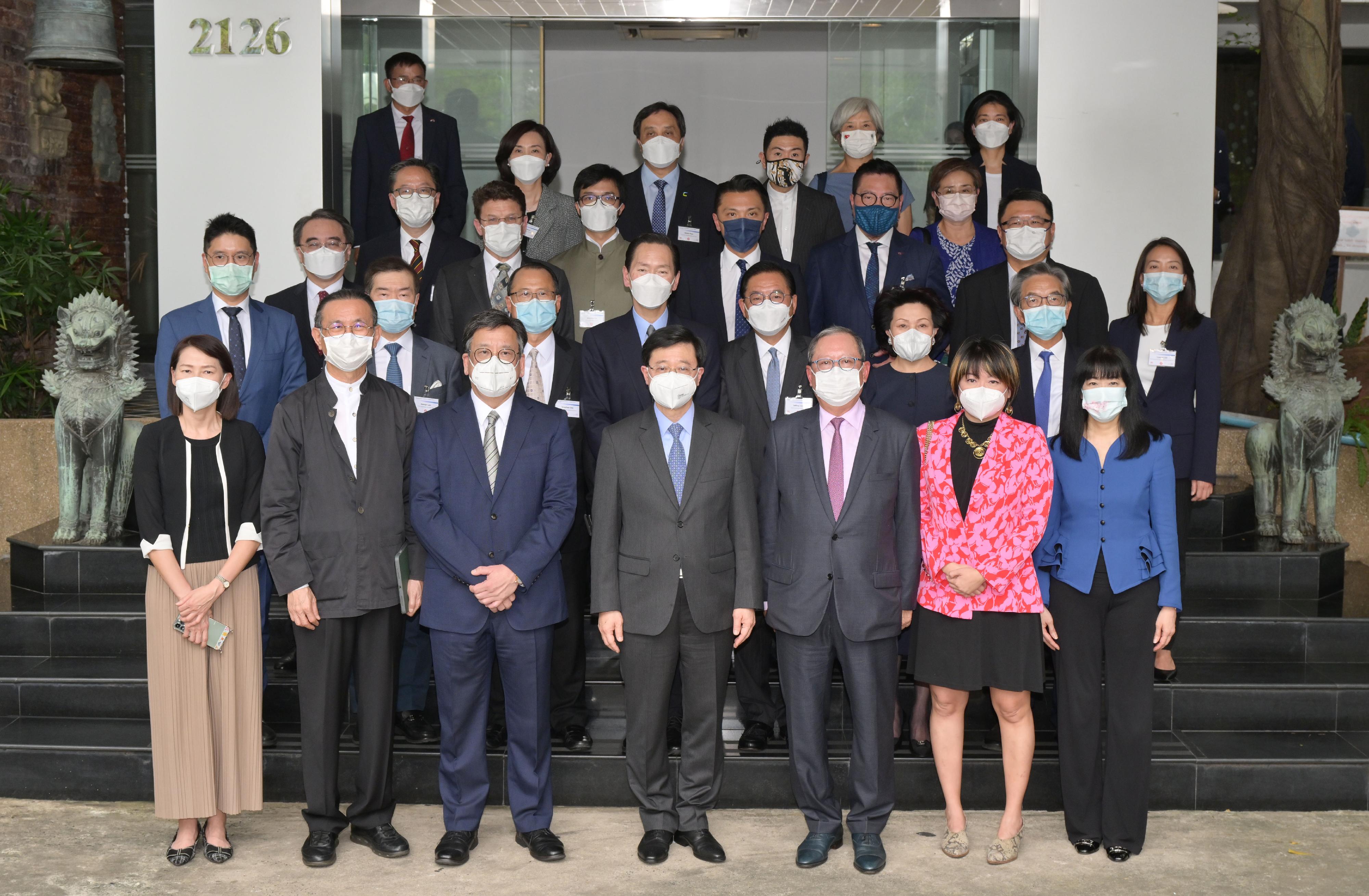 The Chief Executive, Mr John Lee, visited Amata Corporation Public Company Limited (PCL) in Bangkok, Thailand, today (November 20). Photo shows Mr Lee (first row, centre); the Secretary for Commerce and Economic Development, Mr Algernon Yau (first row, third left); the Chairman of the Hong Kong Trade Development Council, Dr Peter Lam (first row, third right); the Founder and Chairman of Amata Corporation PCL, Mr Vikrom Kromadit (first row, second left), the Hong Kong business delegation and the Group's representatives.
