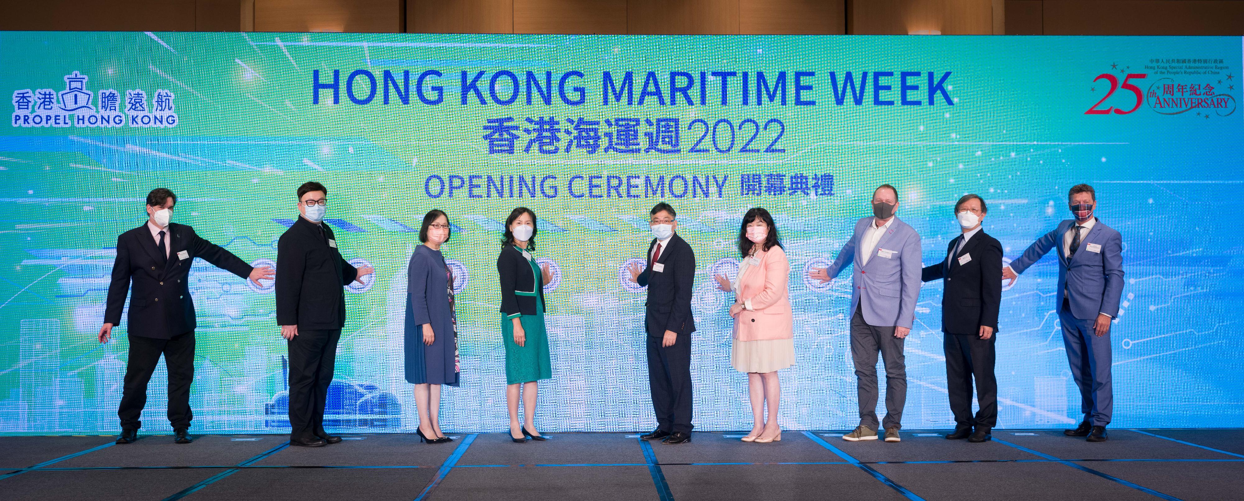 The opening ceremony of Hong Kong Maritime Week 2022, a major annual event of the maritime and port industries in Hong Kong, was held today (November 21). Photo shows the Chairman of the Hong Kong Maritime and Port Board (HKMPB) and the Secretary for Transport and Logistics, Mr Lam Sai-hung (centre), together with the Permanent Secretary for Transport and Logistics, Ms Mable Chan (fourth left); the Director of Marine, Ms Carol Yuen (third left); the Chairman of the Promotion and External Relations Committee of the HKMPB, Miss Rosita Lau (fourth right); the Chairman of the Maritime and Port Development Committee of the HKMPB, Mr Bjorn Hojgaard (third right); the Chairman of the Manpower Development Committee of the HKMPB, Mr Willy Lin (second right); the Chairman of the Hong Kong Shipowners Association, Mr Wellington Koo (second left); the Deputy Secretary General of the International Chamber of Shipping, Mr Simon Bennett (first left); and the Director of Hong Kong Maritime Museum, Professor Joost Schokkenbroek (first right), officiating at the ceremony.