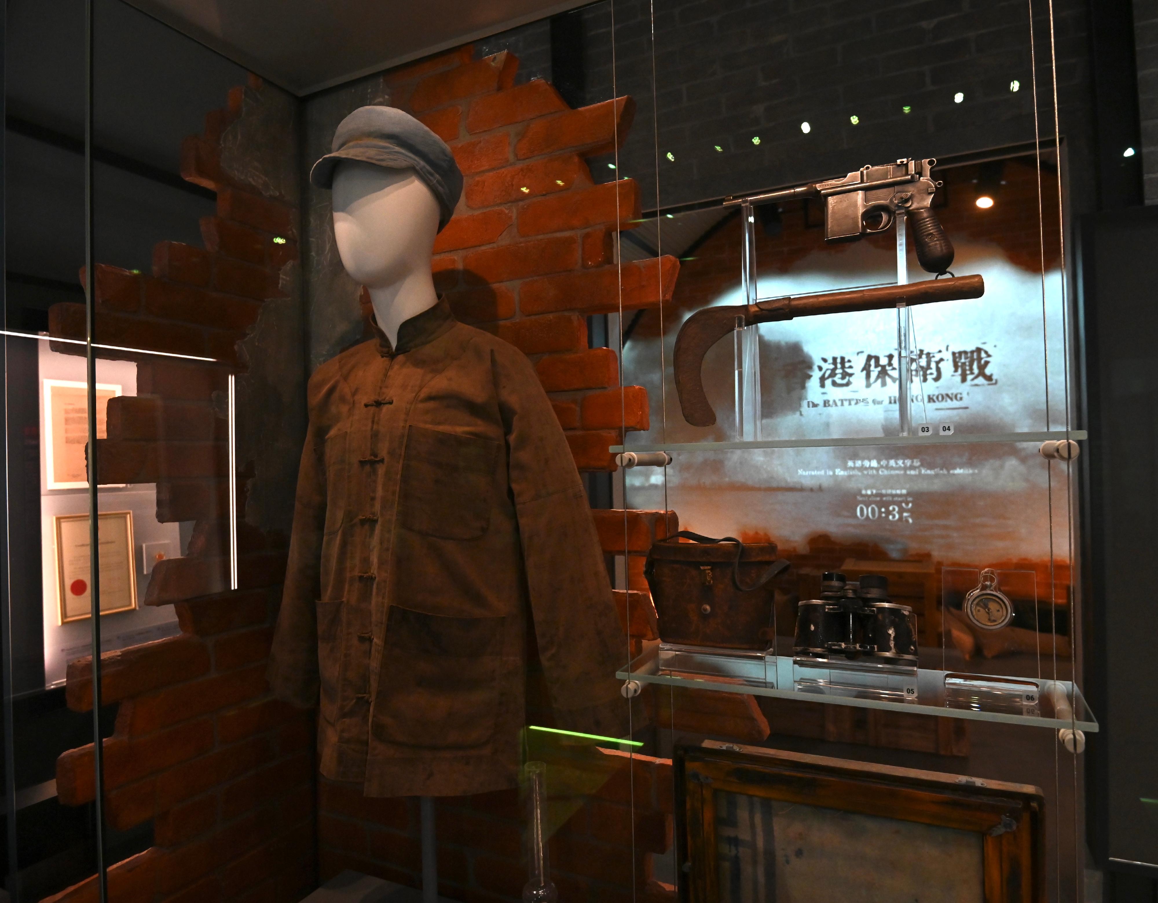 The Hong Kong Museum of Coastal Defence will reopen to the public from tomorrow (November 24) and bring forward a new permanent exhibition, "The Story of Hong Kong Coastal Defence". Picture shows the attire worn by members of the Hong Kong and Kowloon Independent Brigade of the East River Column displayed in the "Anti-Japanese Guerrillas behind Enemy Lines" gallery. 
