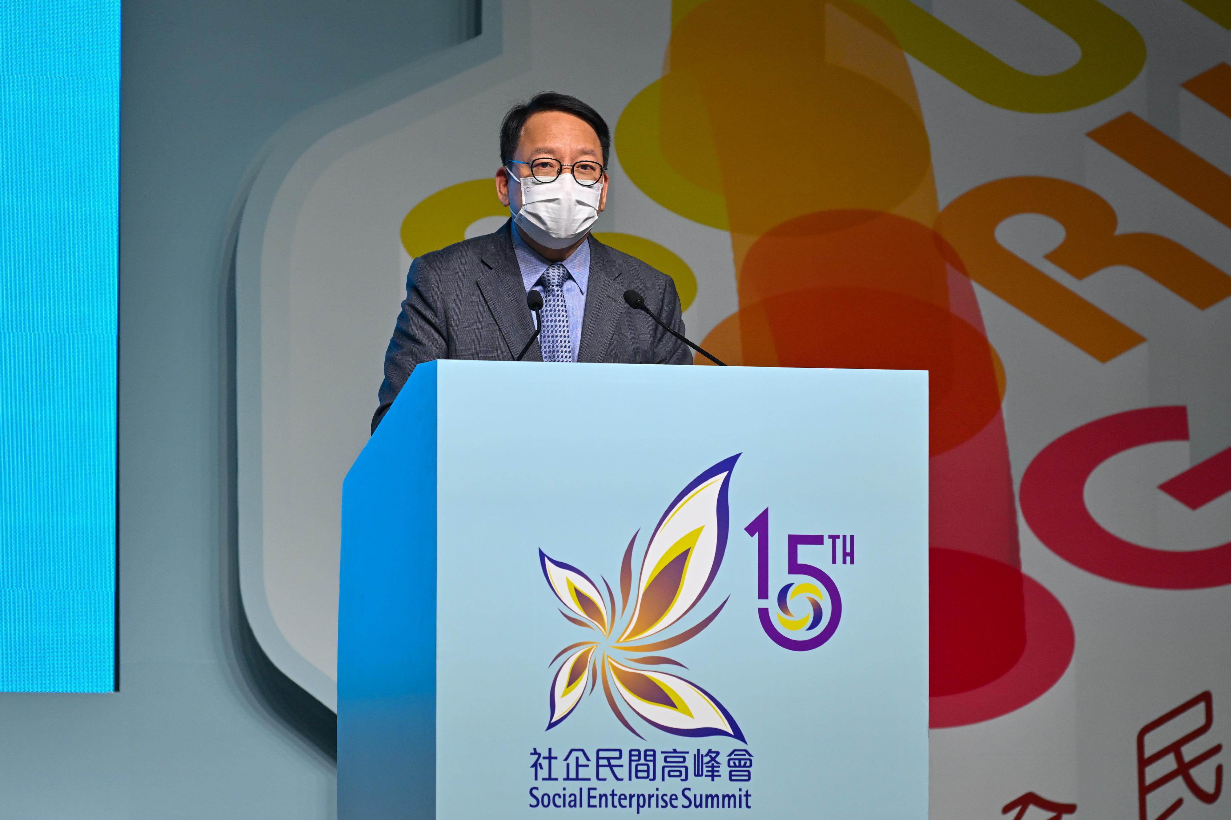 The Chief Secretary for Administration, Mr Chan Kwok-ki, speaks at the opening ceremony of the Social Enterprise Summit 2022 today (November 24).