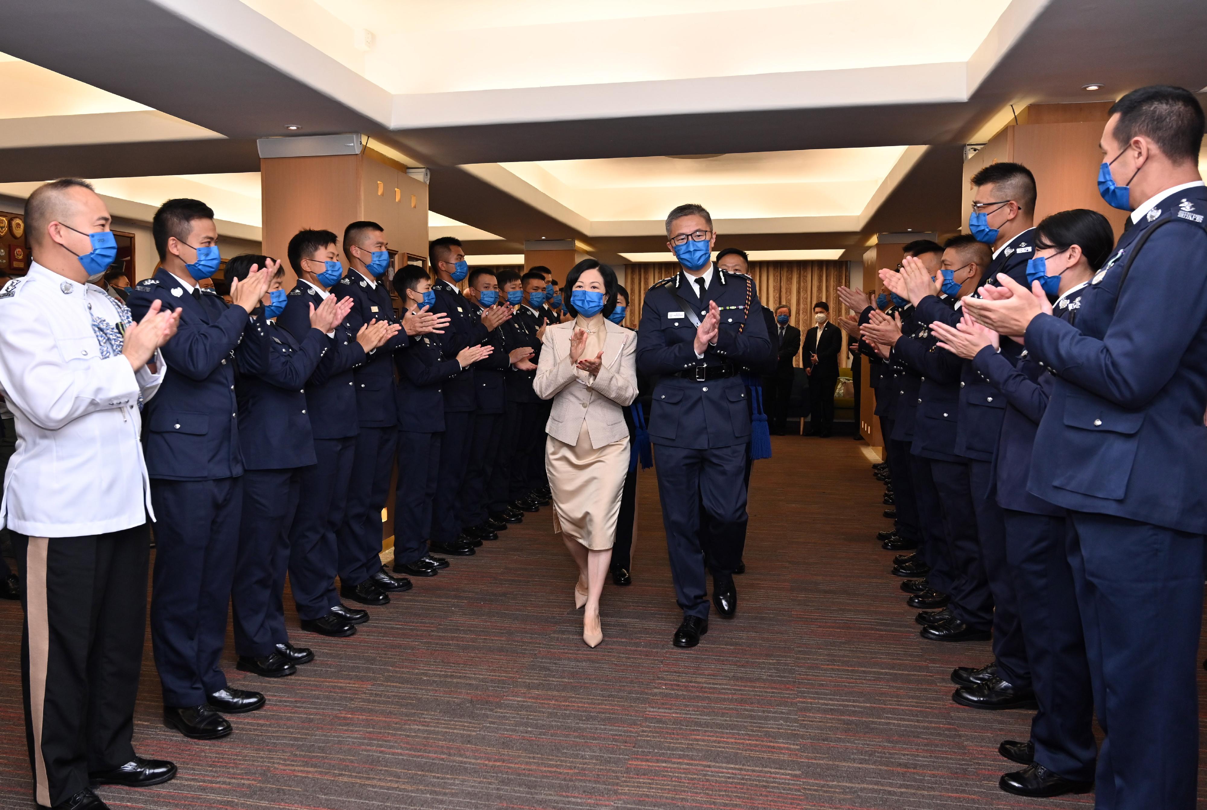 The Convenor of the Non-official Members of the Executive Council, Mrs Regina Ip, and the Commissioner of Police, Mr Siu Chak-yee, congratulate probationary inspectors after the passing-out parade held at the Hong Kong Police College today (November 26).