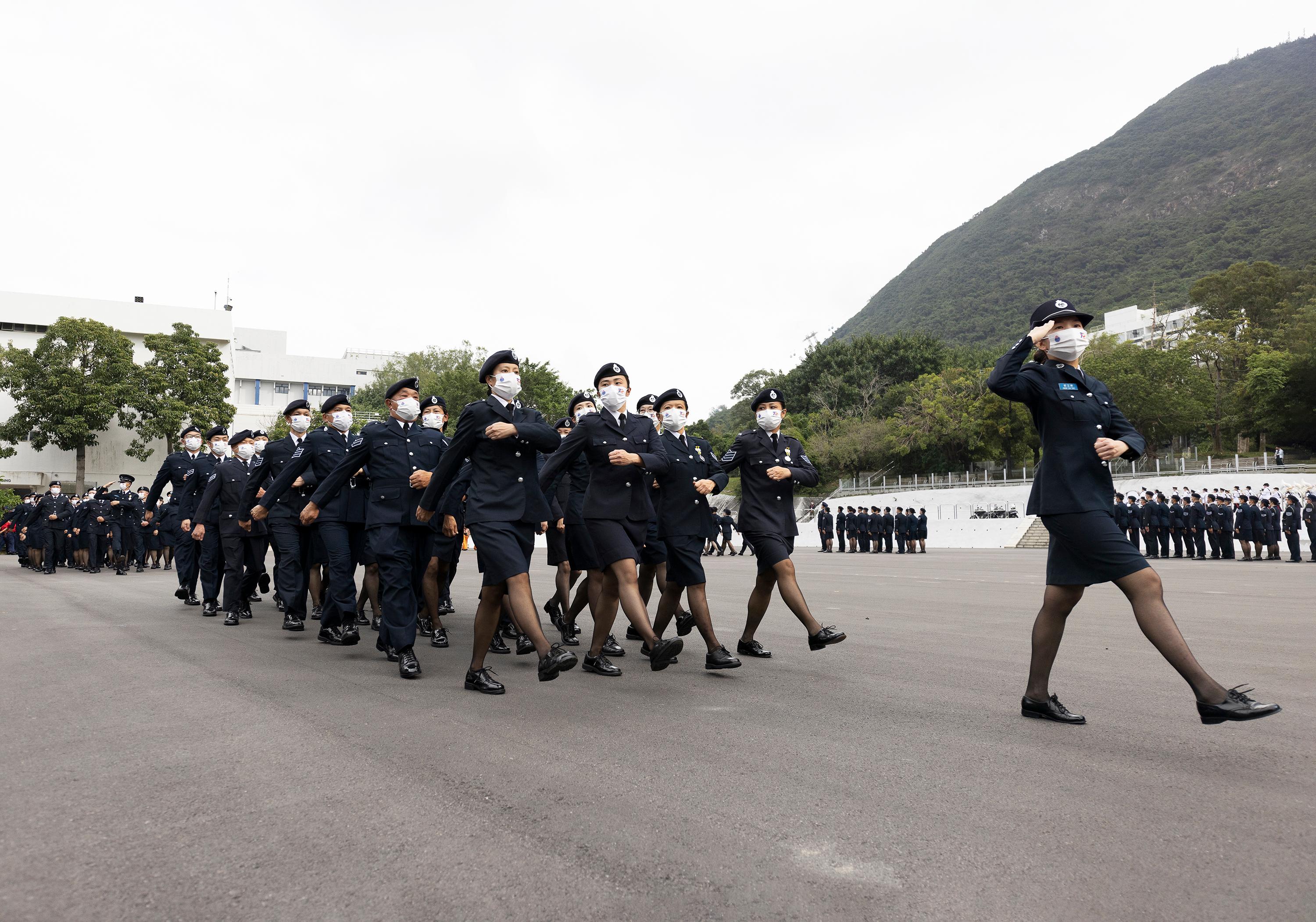 民眾安全服務隊（民安隊）今日（十一月二十七日）於香港警察學院舉行「慶祝香港特別行政區成立二十五周年及民安隊七十周年紀念大會操」。圖示民安隊隊員展示中式步操的踢正步特色，步伐鏗鏘有力。