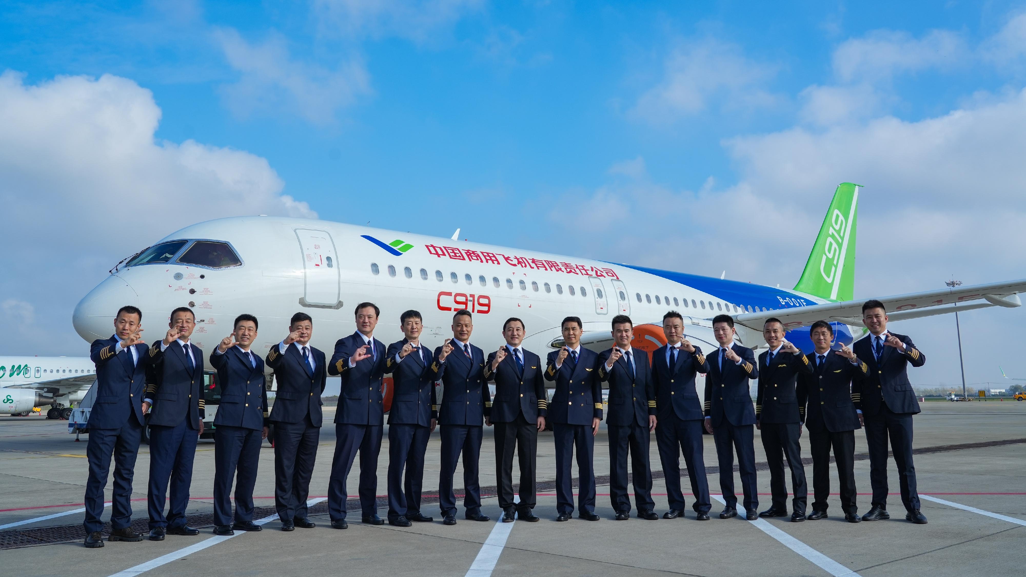 Fifteen flight operations experts from the Civil Aviation Administration of China, China Eastern Airlines, Commercial Aircraft Corporation of China and the Hong Kong Civil Aviation Department (CAD) successfully completed the two-month C919 T5 Test for flight crew training in Shanghai. Photo shows Captain Joe Lee (third right) from the CAD is pictured in front of the C919 aircraft with other flight operations experts participating in the Test.