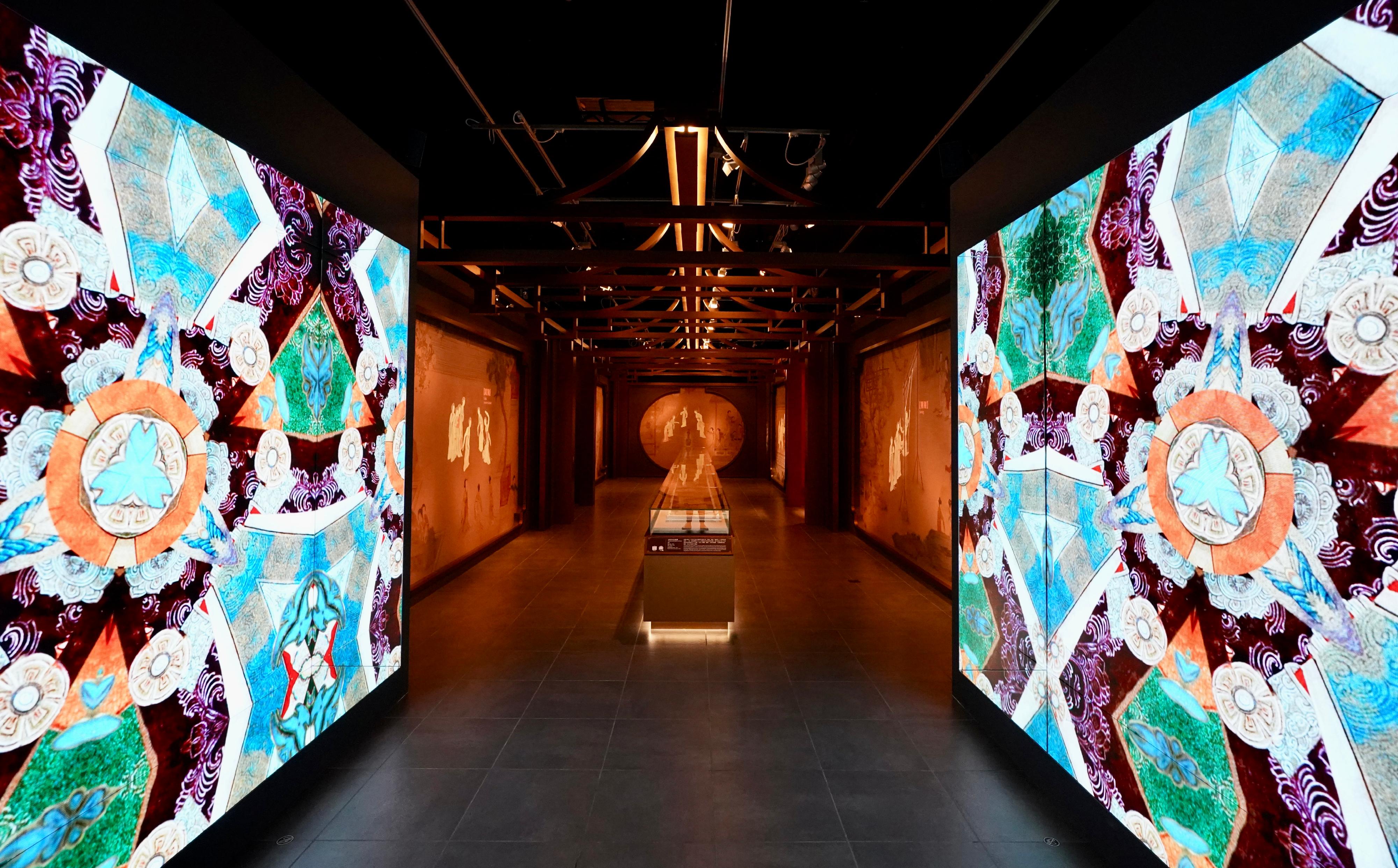 The opening ceremony for the exhibition "The Hong Kong Jockey Club Series: Women and Femininity in Ancient China - Treasures from the Nanjing Museum" was held today (November 29) at the Hong Kong Heritage Museum. Photo shows a multimedia display at the entrance of the exhibition gallery. 