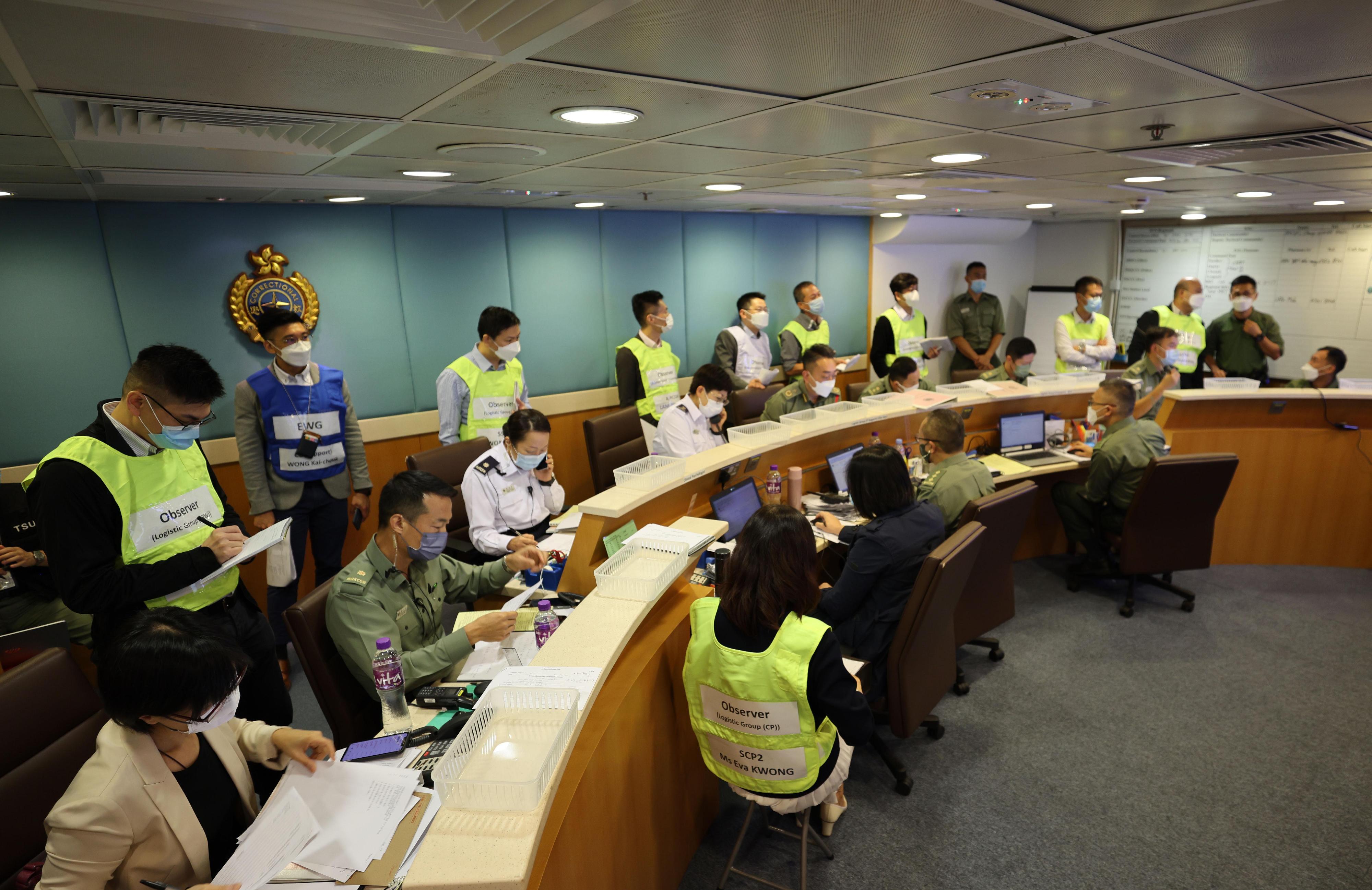 The Correctional Services Department conducted an emergency exercise, code-named Concord XXI, today (November 30) to test the emergency response of its various units in different scenarios including mass indiscipline of persons in custody, a hostage-taking situation and members of the public attempting to damage correctional facilities at Sha Tsui Correctional Institution. Photo shows the department's Central Control Centre in operation during the exercise.