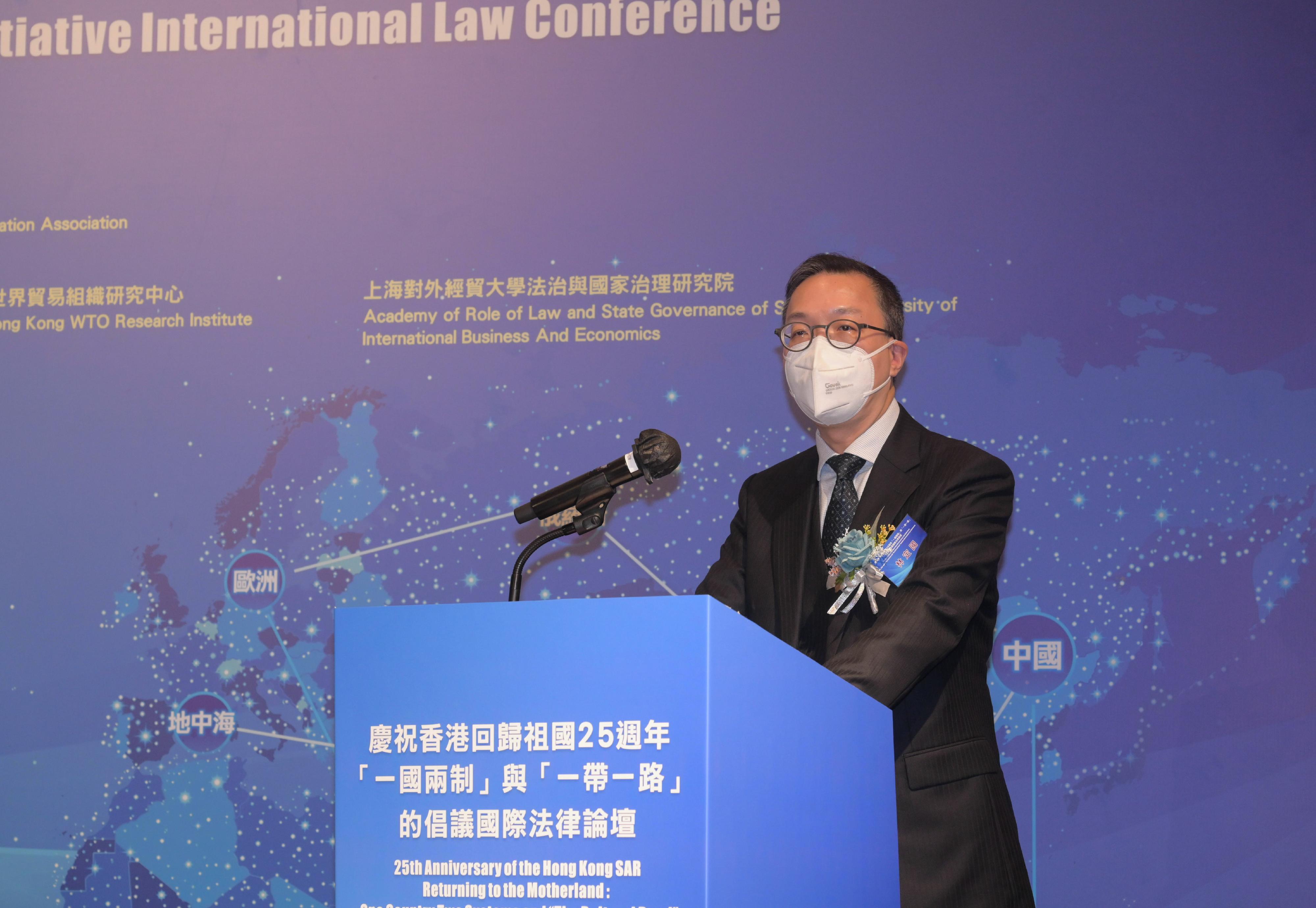 The Secretary for Justice, Mr Paul Lam, SC, speaks at an international law conference on "one country, two systems" and the Belt and Road Initiative organised by the Hong Kong Basic Law Education Association today (December 3).