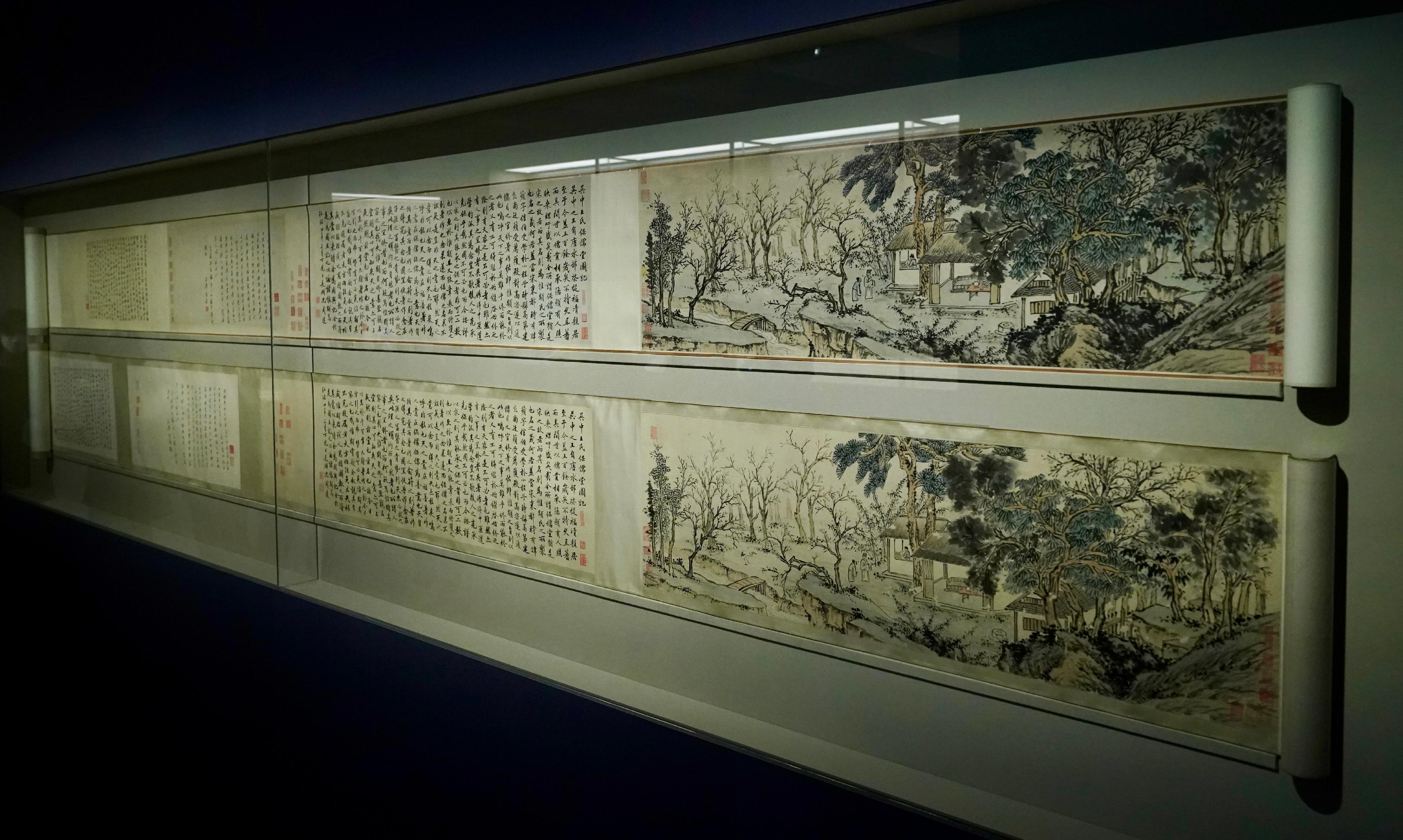 The Hong Kong Museum of Art will launch a new exhibition, "The Connoisseurship and Collection of the Master of Chih Lo Lou", tomorrow (December 9) highlighting memorable personal stories of the late Hong Kong collector Ho Iu-kwong, as well as his insights into the authentication and appreciation of Chinese painting and calligraphy. Photo shows "Hall of Preserving Confucianism" by Ming dynasty artist Shen Zhou and its copy. Visitors are invited to authenticate the two paintings and try to distinguish between authentic and forged artworks.