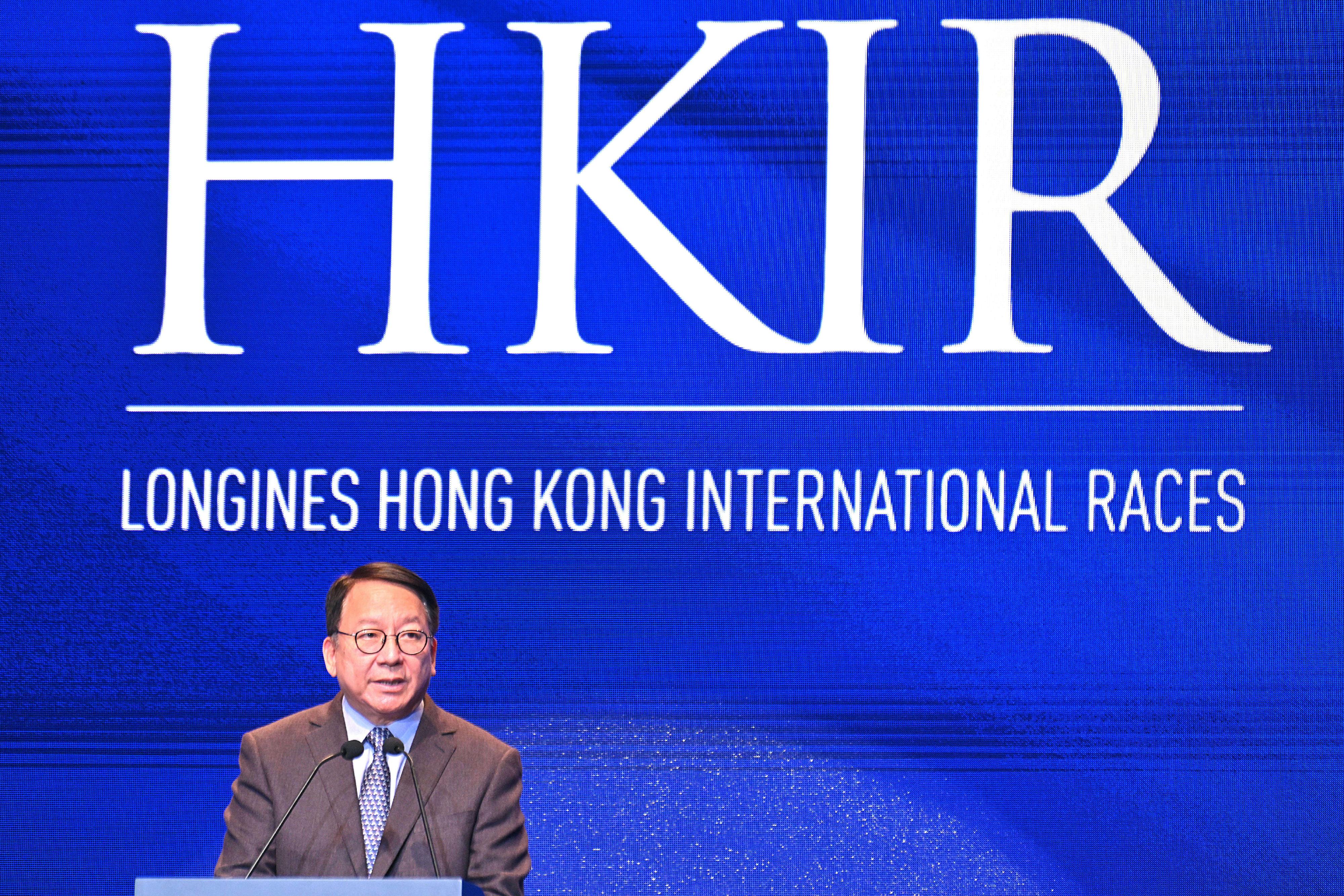 The Chief Secretary for Administration, Mr Chan Kwok-ki, speaks at the LONGINES Hong Kong International Races Gala Dinner today (December 9).