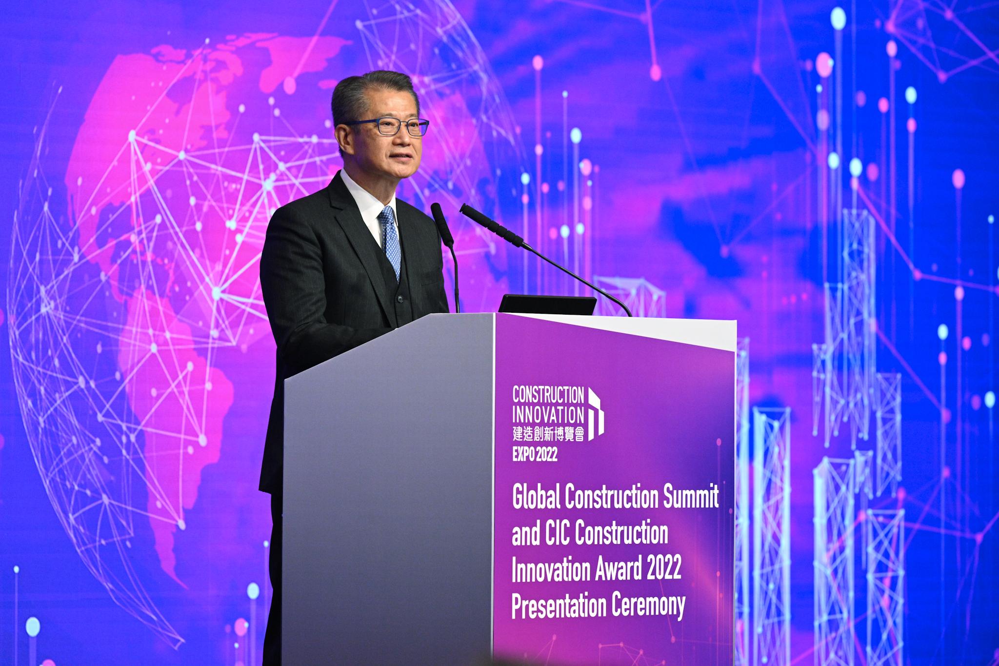 The Financial Secretary, Mr Paul Chan, speaks at the Global Construction Summit and CIC Construction Innovation Award 2022 Presentation Ceremony today (December 13). 

